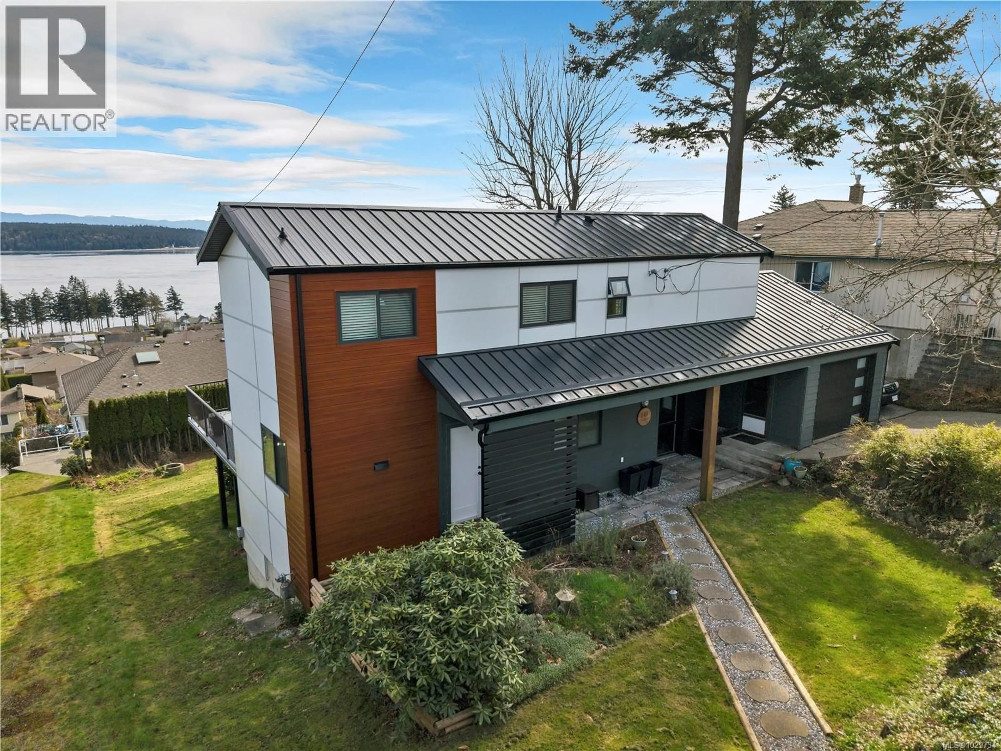 A pic from outside/outdoor area/front of a property/back of a property/a pic from drone, water/lake/river/ocean view for 241 ALDER STREET SOUTH, Campbell River British Columbia V9W2M9