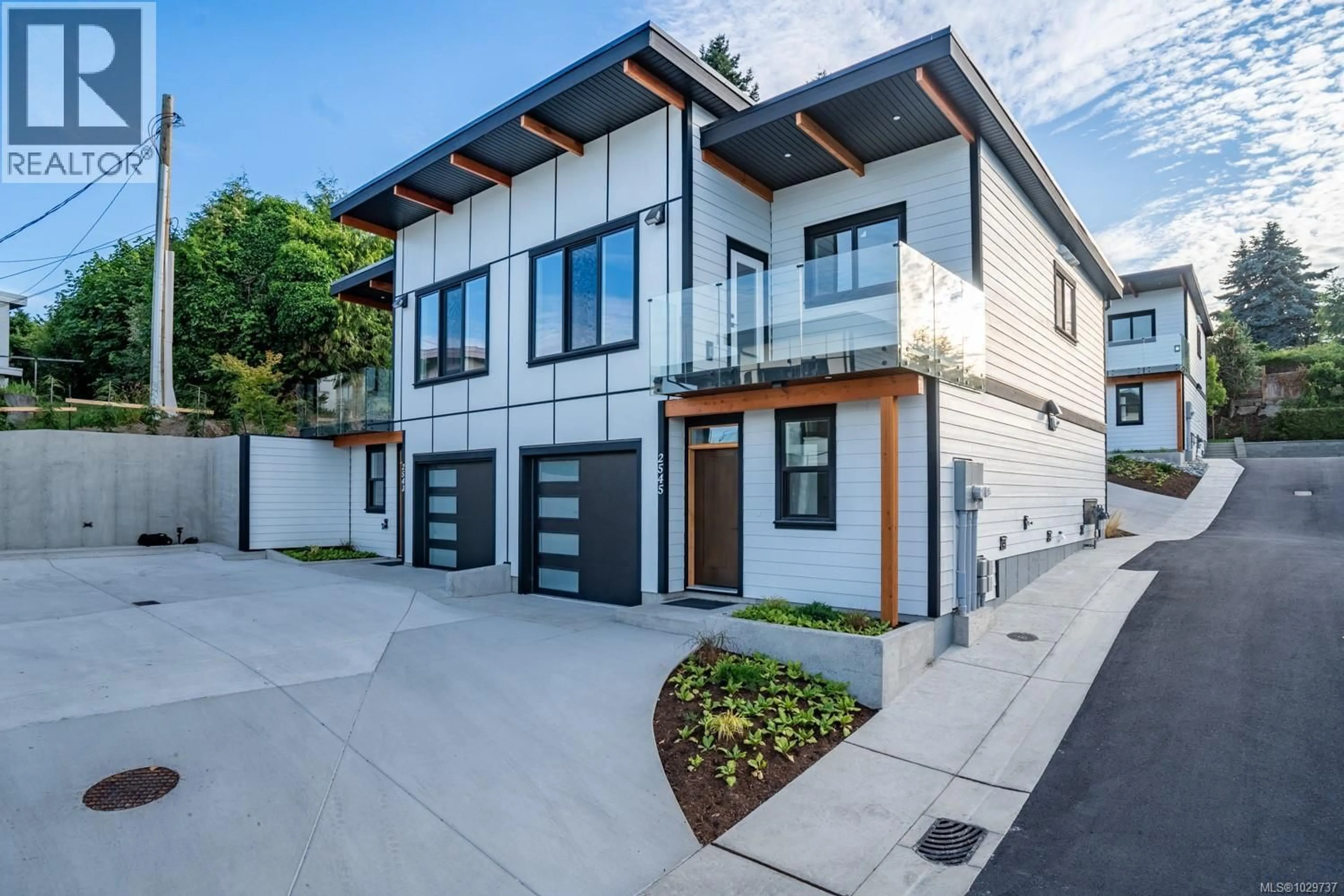 Home with brick exterior material, street for 2543 DOCTORS ROAD, Nanaimo British Columbia V9S3V4