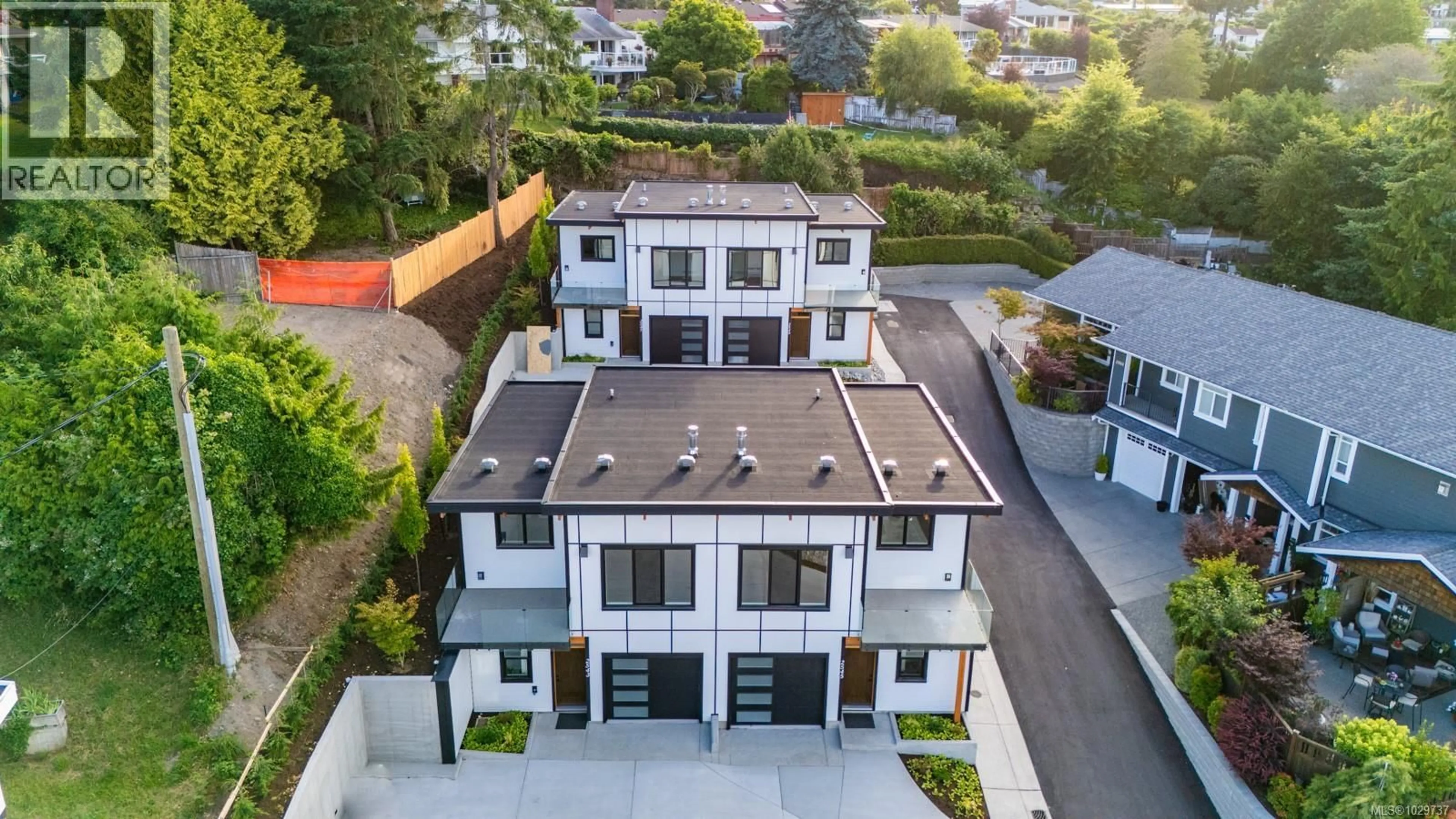 A pic from outside/outdoor area/front of a property/back of a property/a pic from drone, street for 2543 DOCTORS ROAD, Nanaimo British Columbia V9S3V4