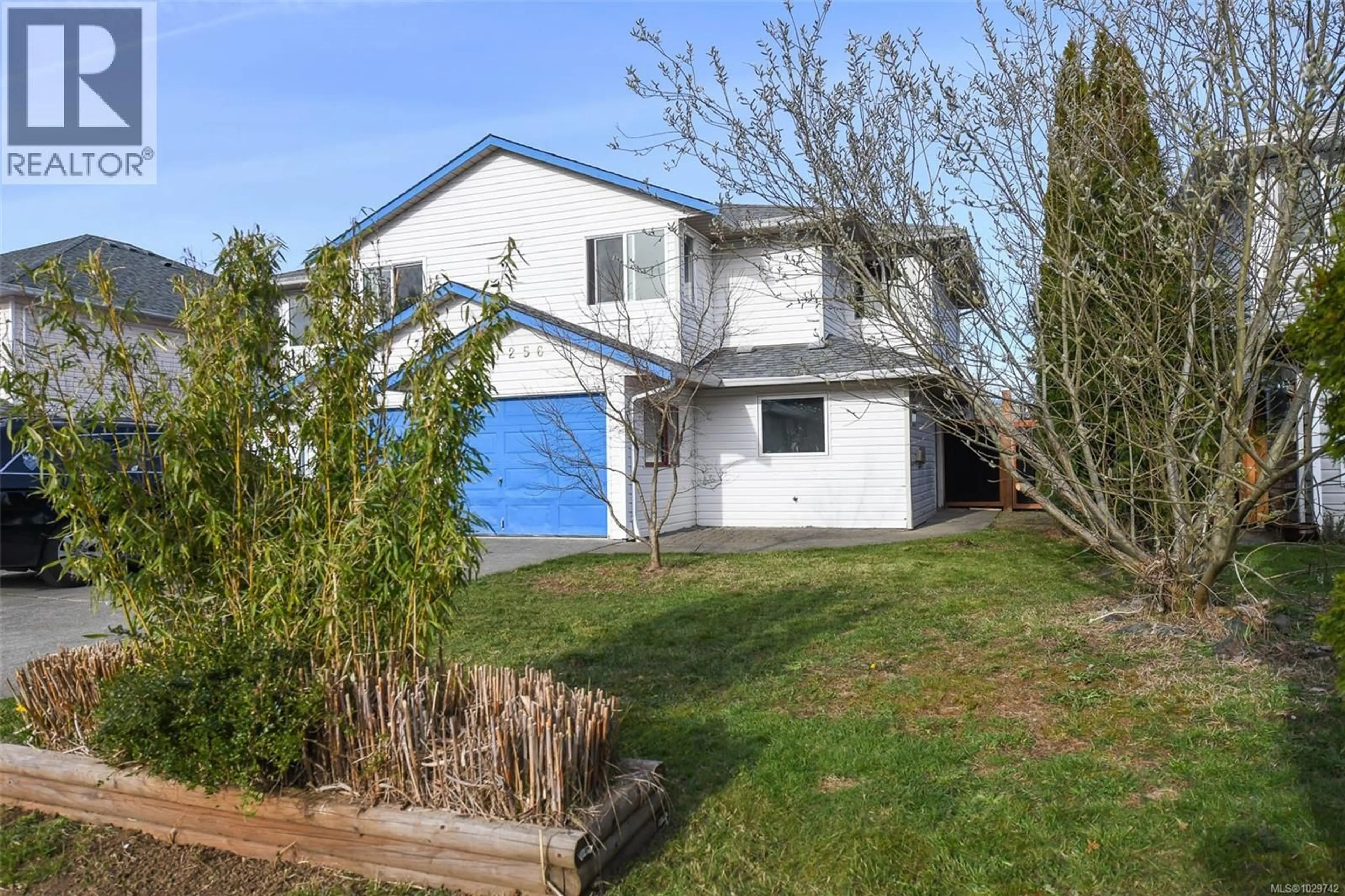 A pic from outside/outdoor area/front of a property/back of a property/a pic from drone, street for B - 1256 JOSHUA PLACE, Courtenay British Columbia V9N8Y6