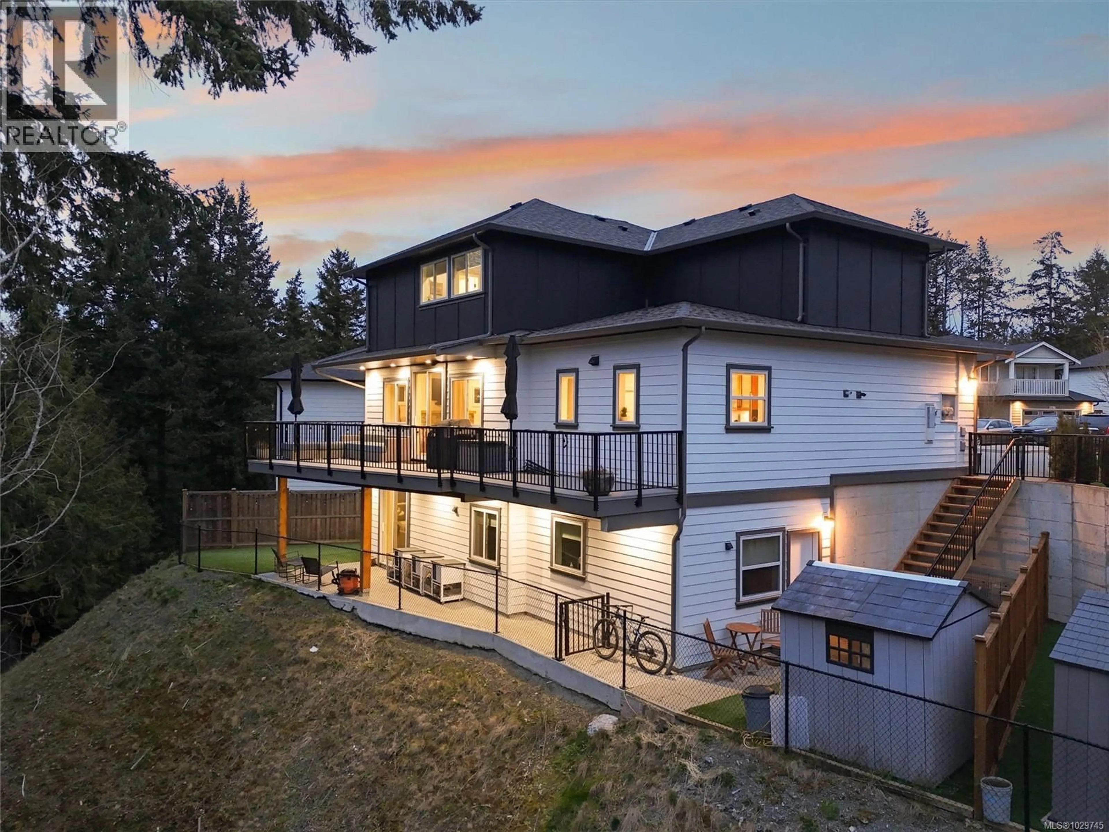 A pic from outside/outdoor area/front of a property/back of a property/a pic from drone, mountain view for 945 BLAKEON PLACE, Langford British Columbia V9C0R3