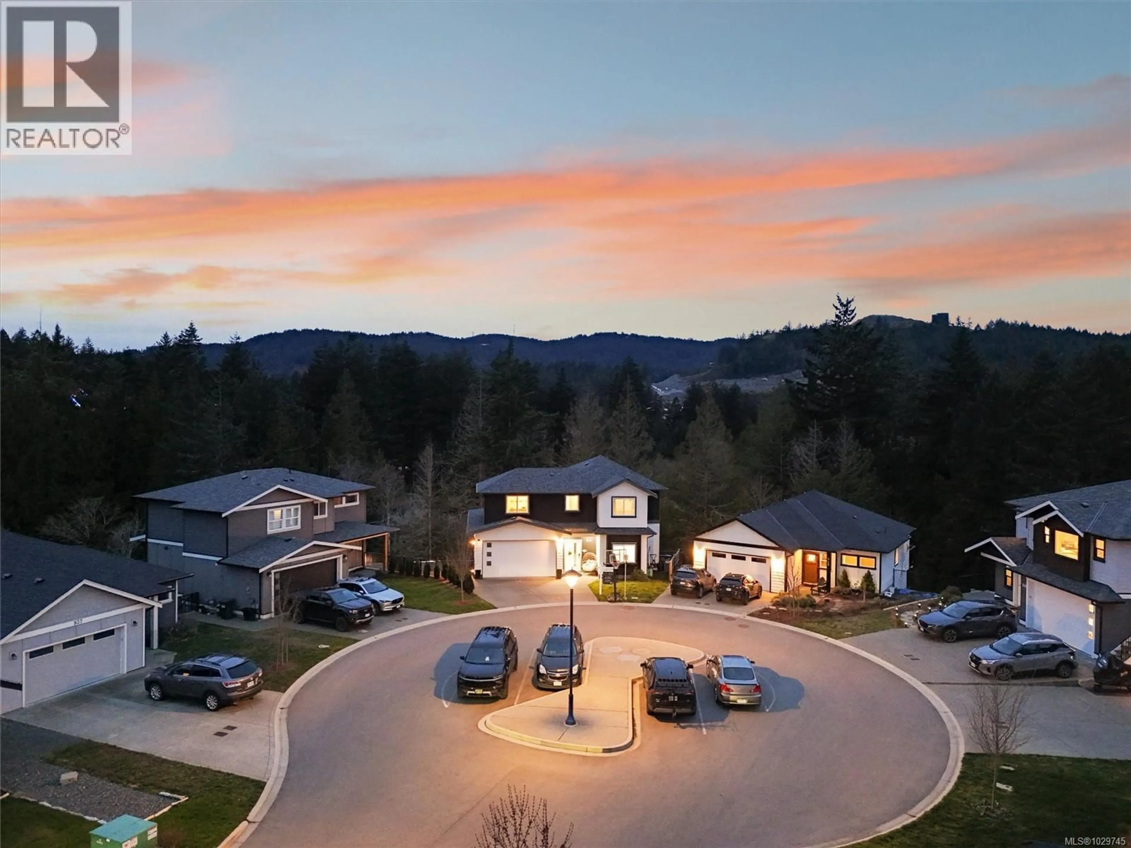 A pic from outside/outdoor area/front of a property/back of a property/a pic from drone, mountain view for 945 BLAKEON PLACE, Langford British Columbia V9C0R3