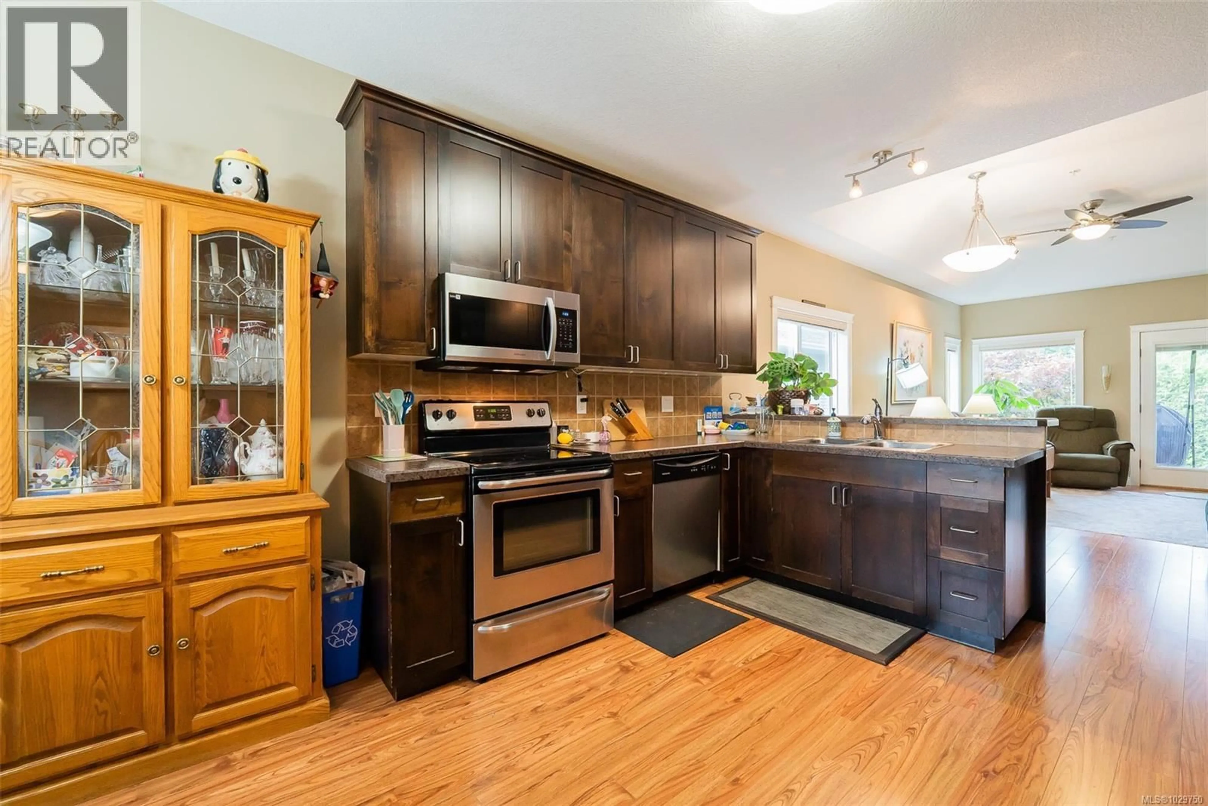 Open concept kitchen, wood/laminate floor for 2405 BRANDON WAY, Nanaimo British Columbia V9T0G2