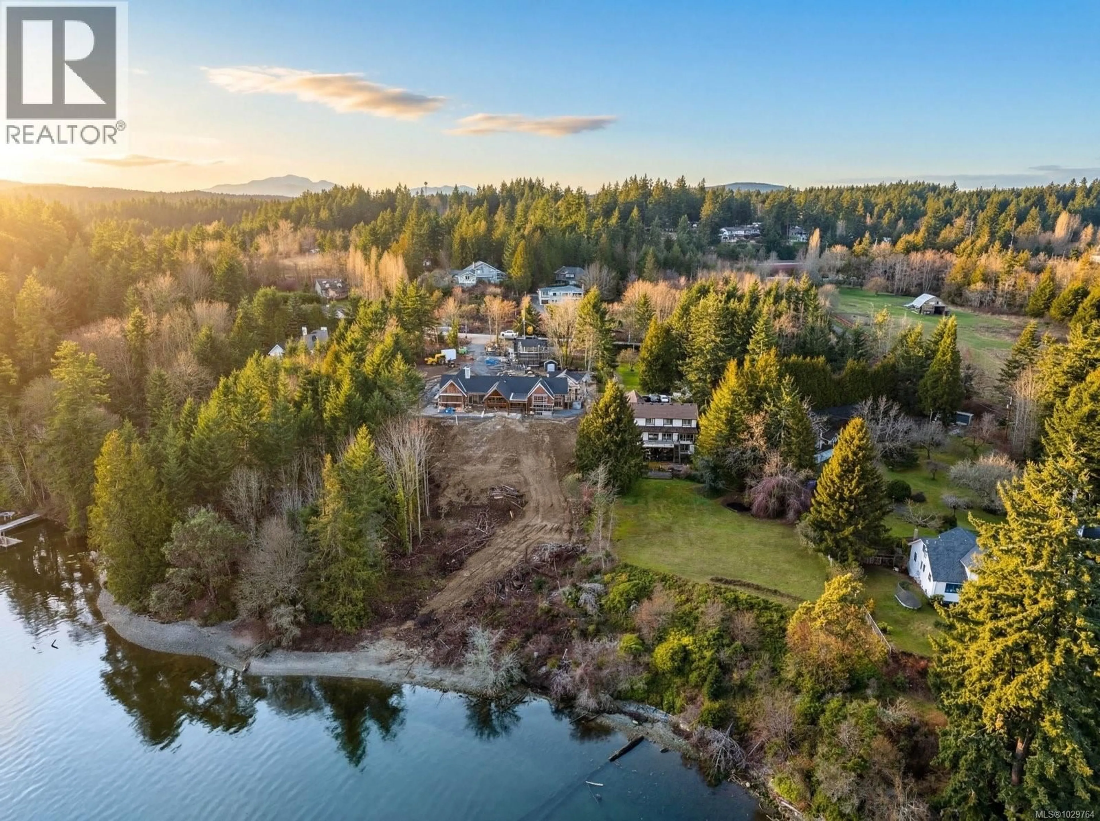 A pic from outside/outdoor area/front of a property/back of a property/a pic from drone, water/lake/river/ocean view for 2839 OCEANSIDE LANE, Mill Bay British Columbia V8H1E1