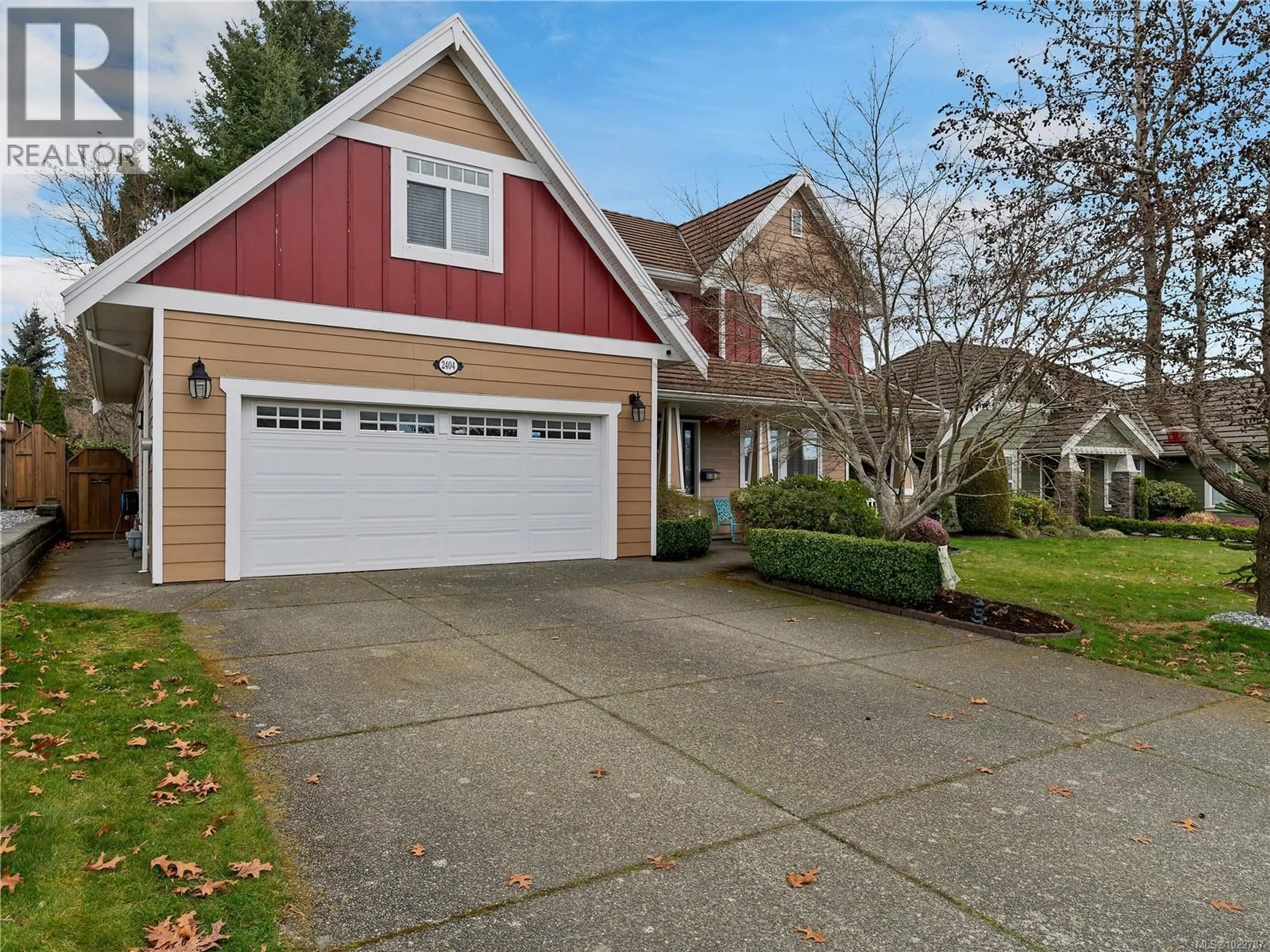 Home with vinyl exterior material, street for 2404 IDIENS WAY, Courtenay British Columbia V9N9J3