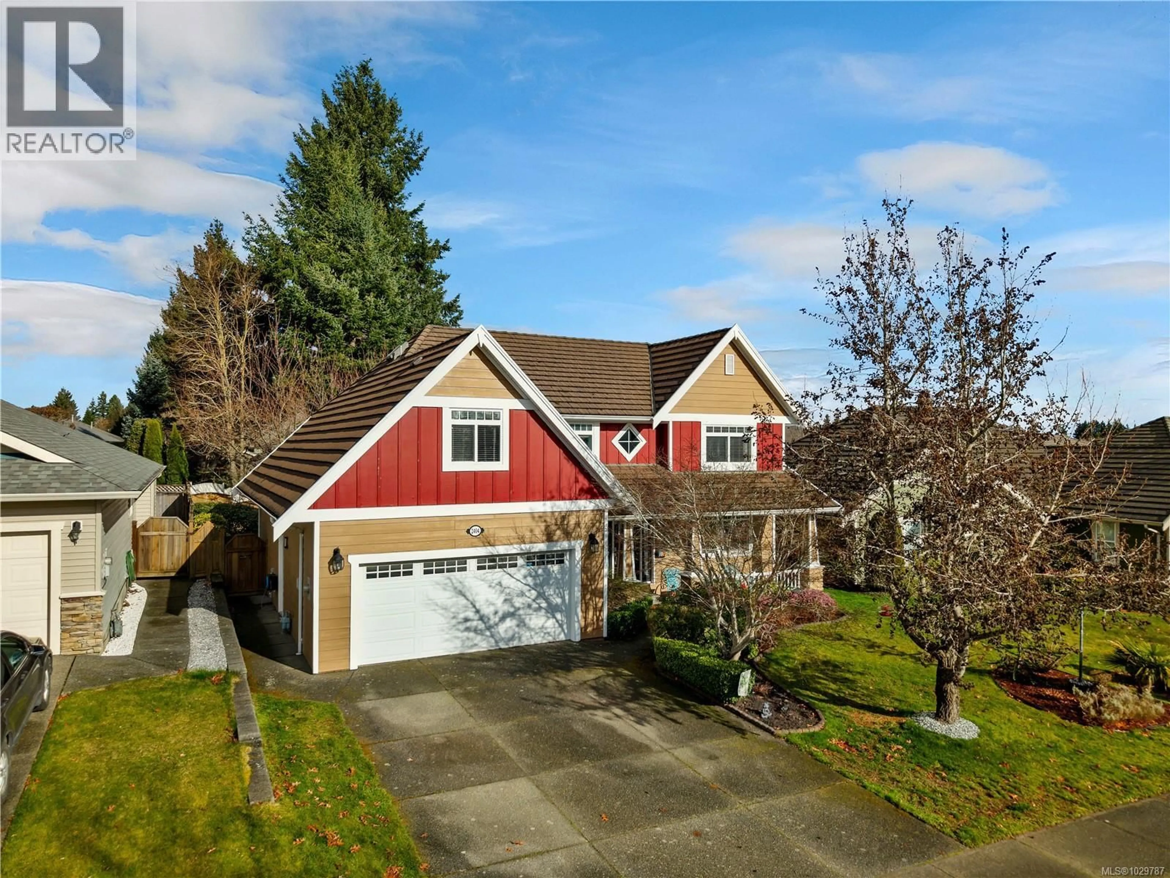 Home with vinyl exterior material, street for 2404 IDIENS WAY, Courtenay British Columbia V9N9J3