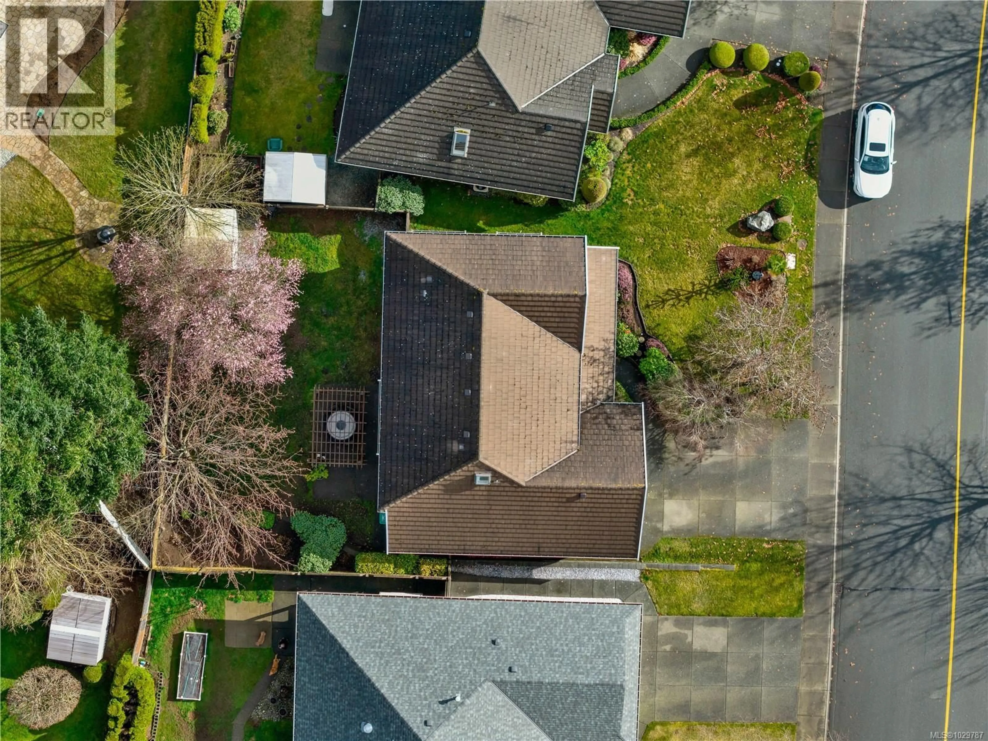 A pic from outside/outdoor area/front of a property/back of a property/a pic from drone, street for 2404 IDIENS WAY, Courtenay British Columbia V9N9J3