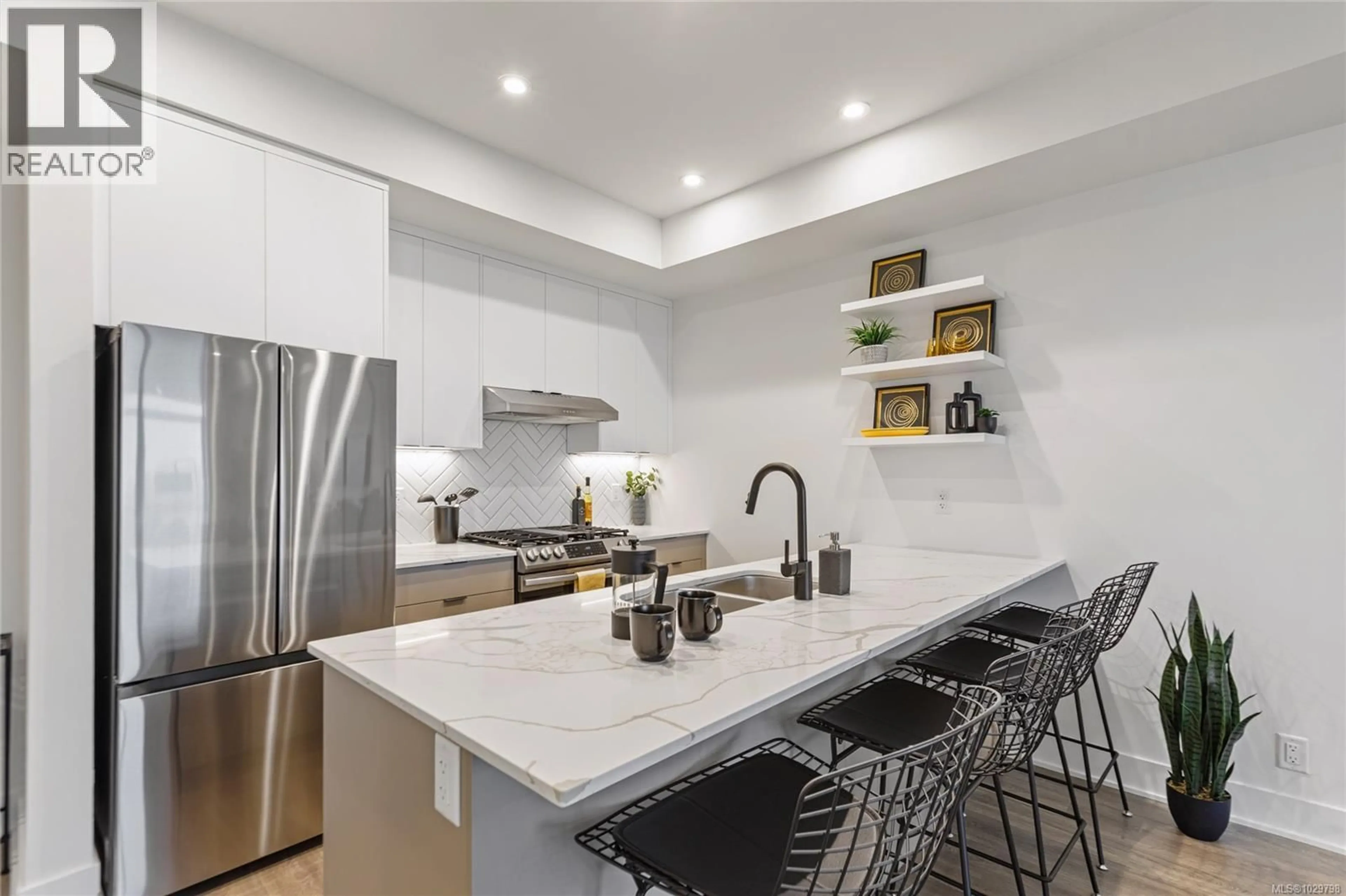 Open concept kitchen, ceramic/tile floor for 407 - 1114 SAMAR CRESCENT, Langford British Columbia V9B7C5