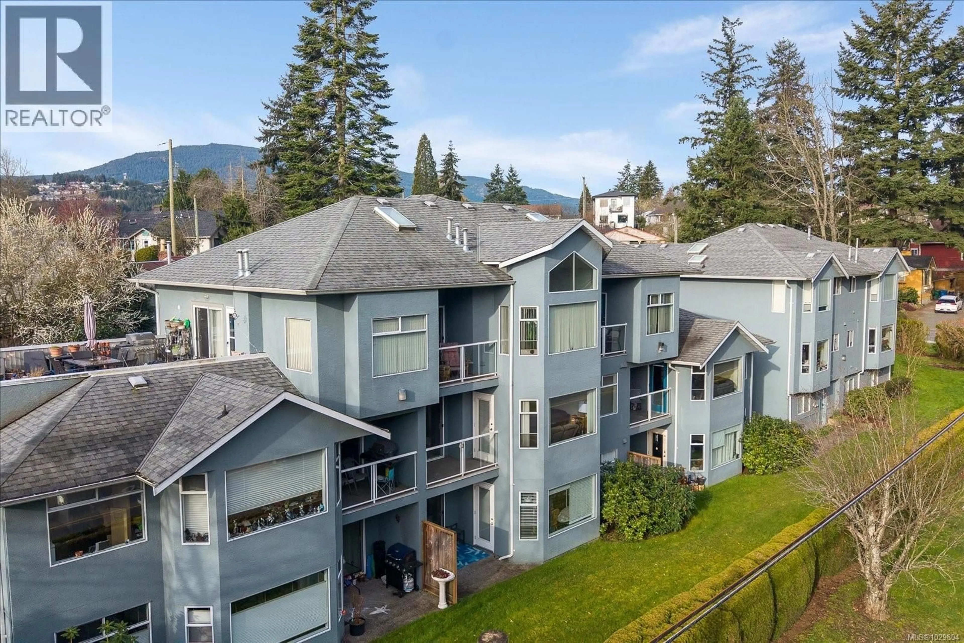 A pic from outside/outdoor area/front of a property/back of a property/a pic from drone, mountain view for 202 - 2 DORIC AVENUE, Nanaimo British Columbia V9R3N1