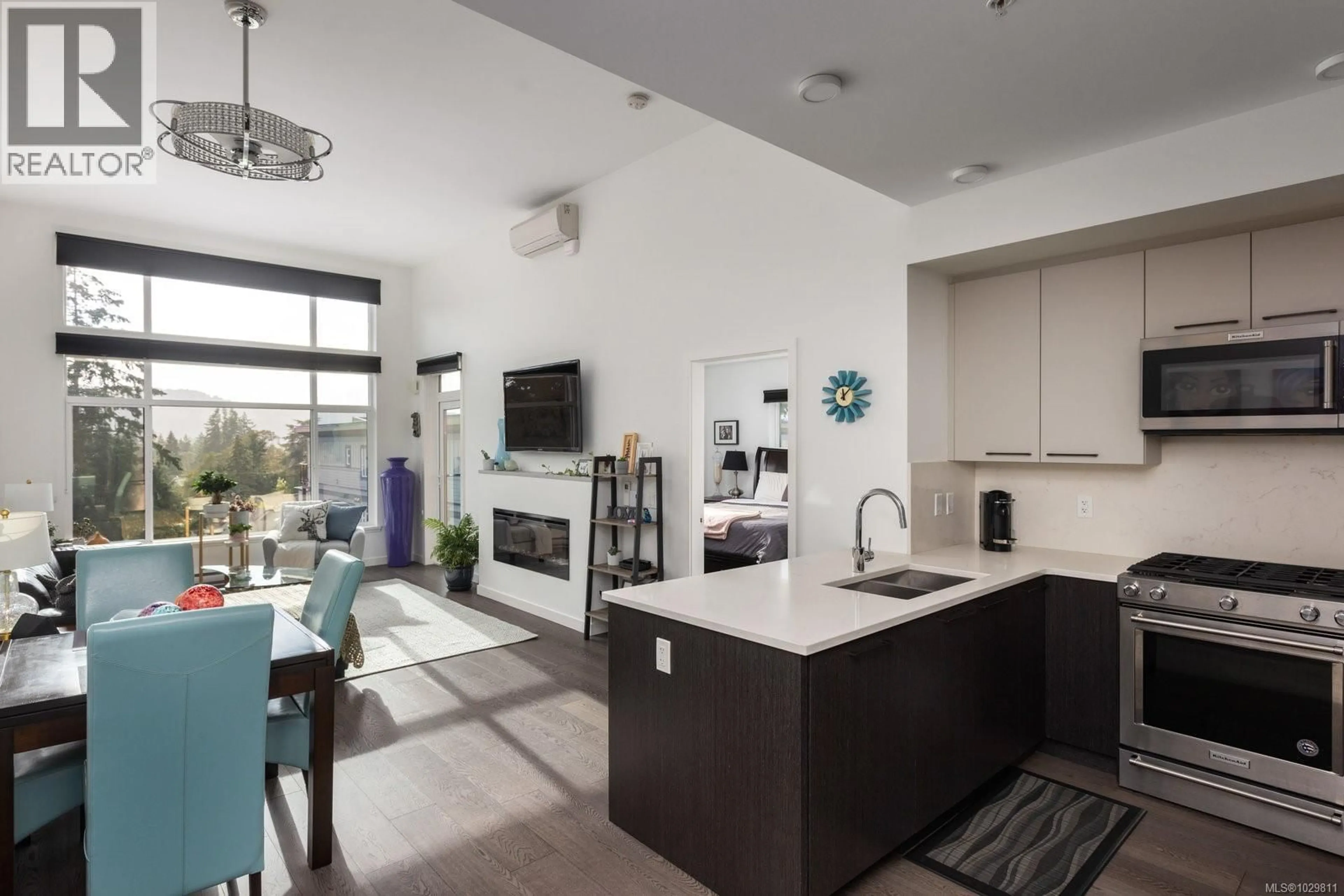 Open concept kitchen, ceramic/tile floor for 508 - 7162 WEST SAANICH ROAD, Central Saanich British Columbia V8M1P6