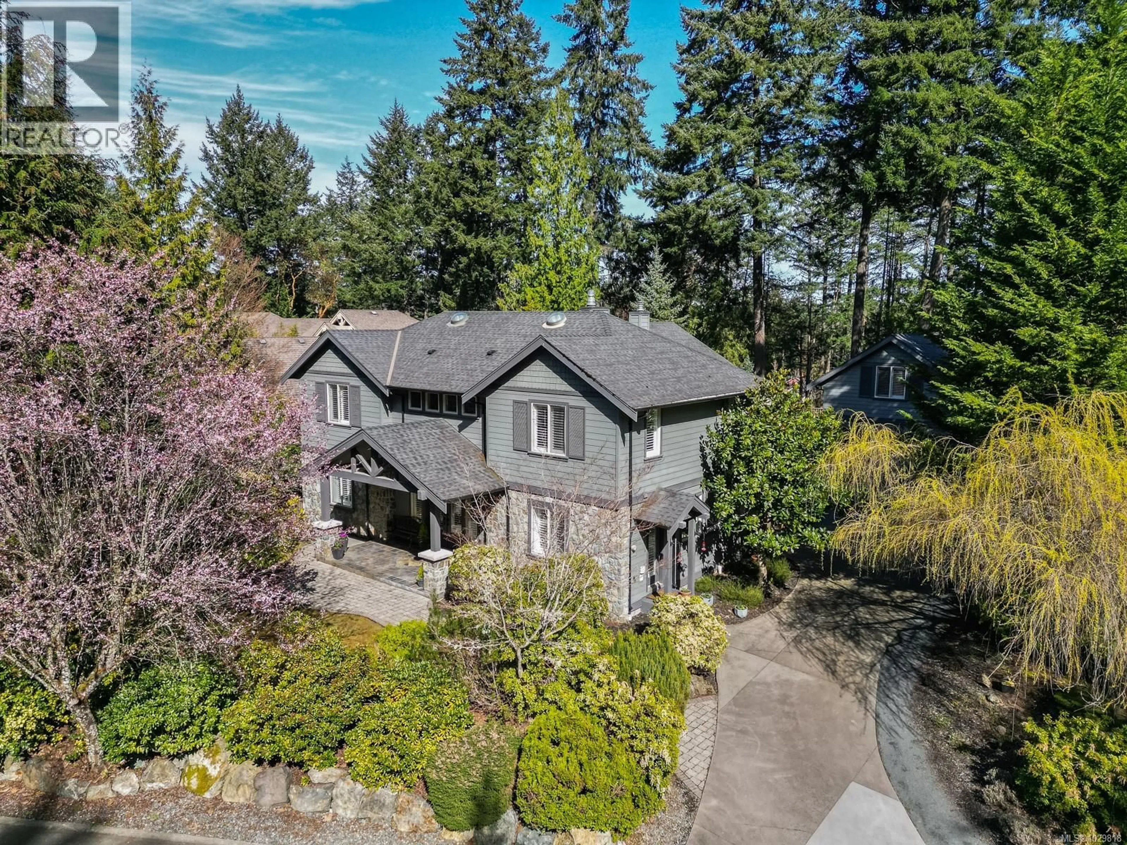 A pic from outside/outdoor area/front of a property/back of a property/a pic from drone, street for 1054 RIVER ROAD, Highlands British Columbia V9B6K2