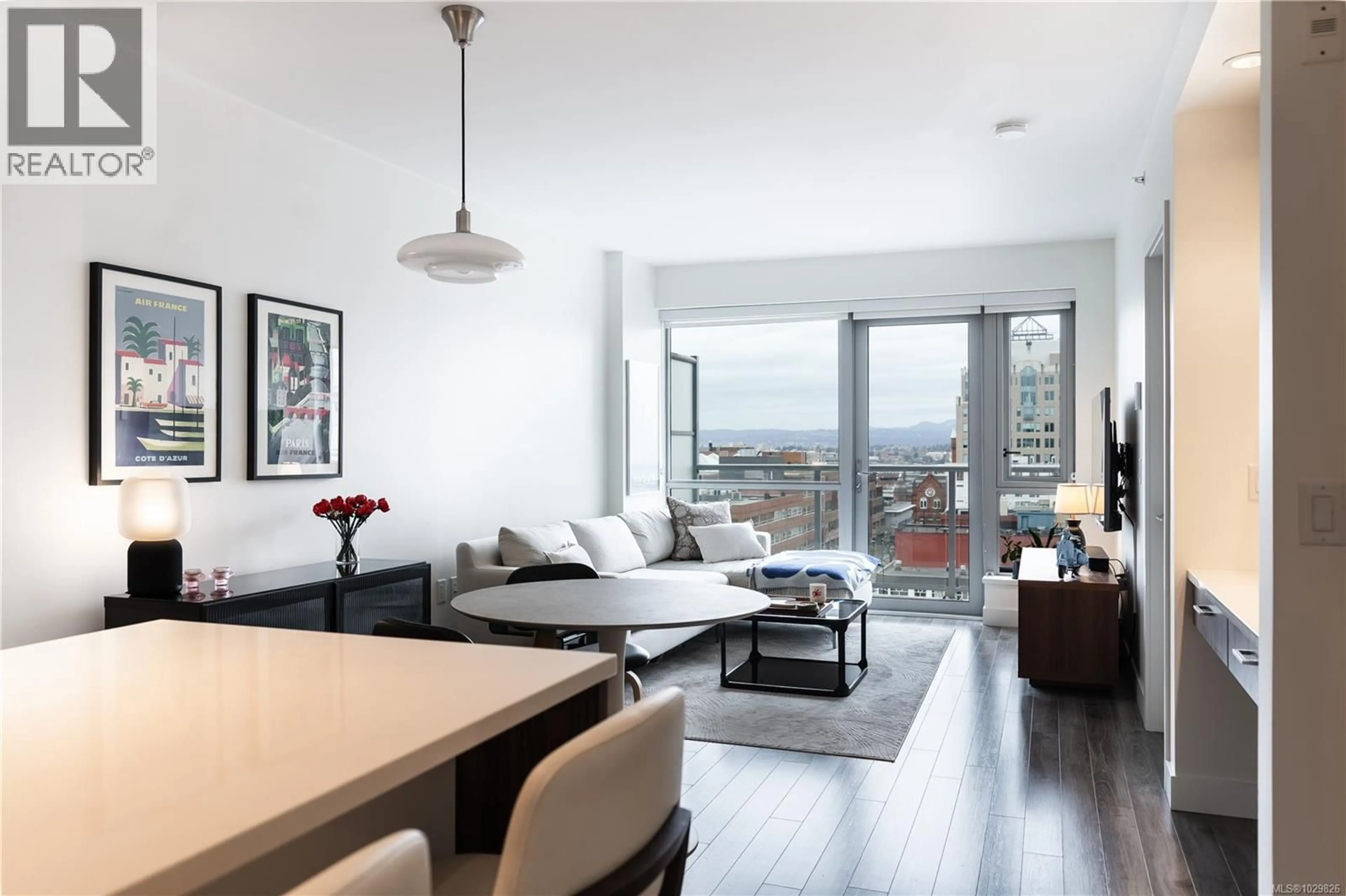 Living room with furniture, wood/laminate floor for 801 - 838 BROUGHTON STREET, Victoria British Columbia V8W1E4