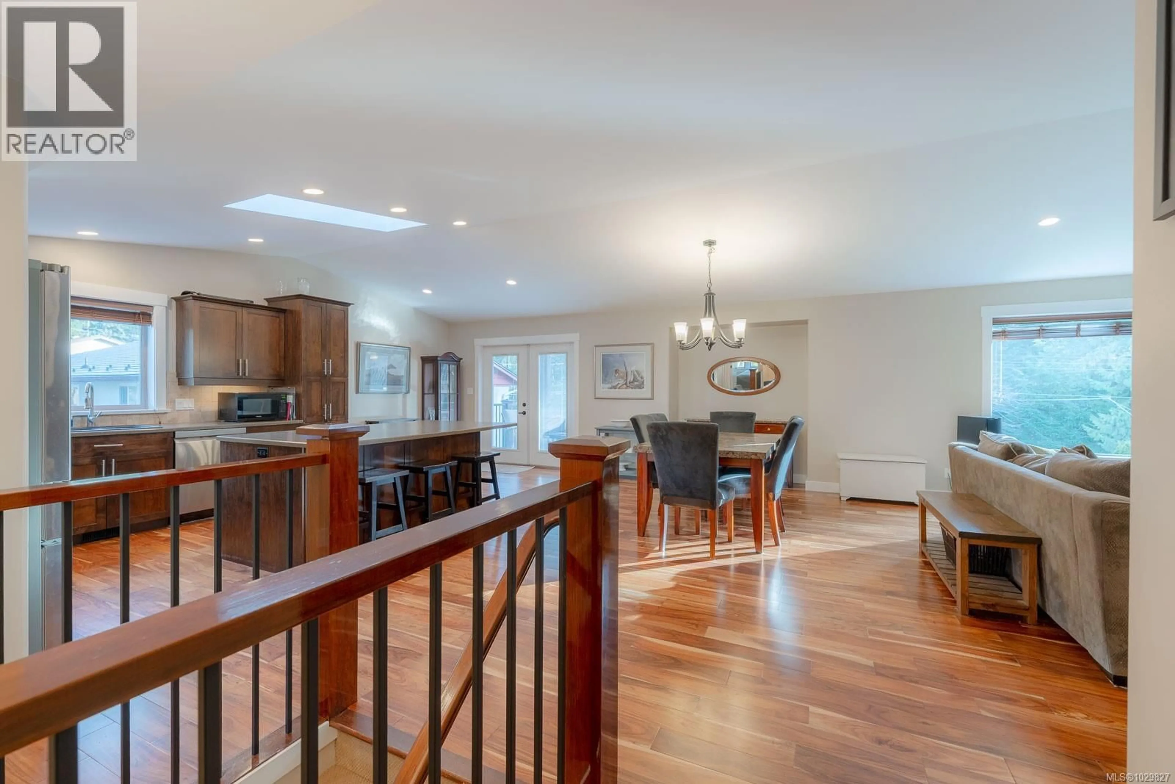 Open concept kitchen, wood/laminate floor for 3050 CHARLES STREET, Nanaimo British Columbia V9T2Y1