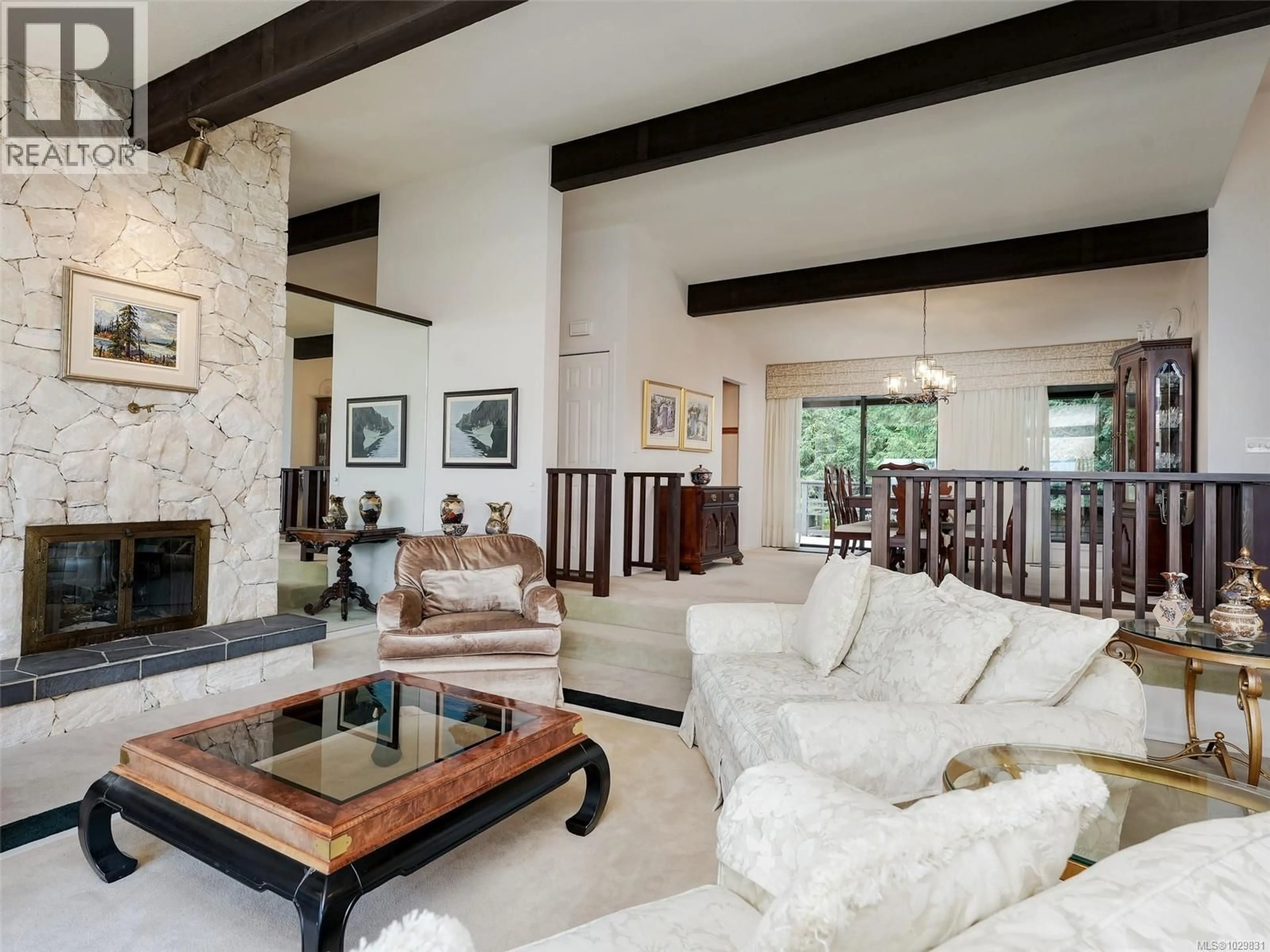Living room with furniture, ceramic/tile floor for 11340 PACHENA PLACE, North Saanich British Columbia V8L5J5