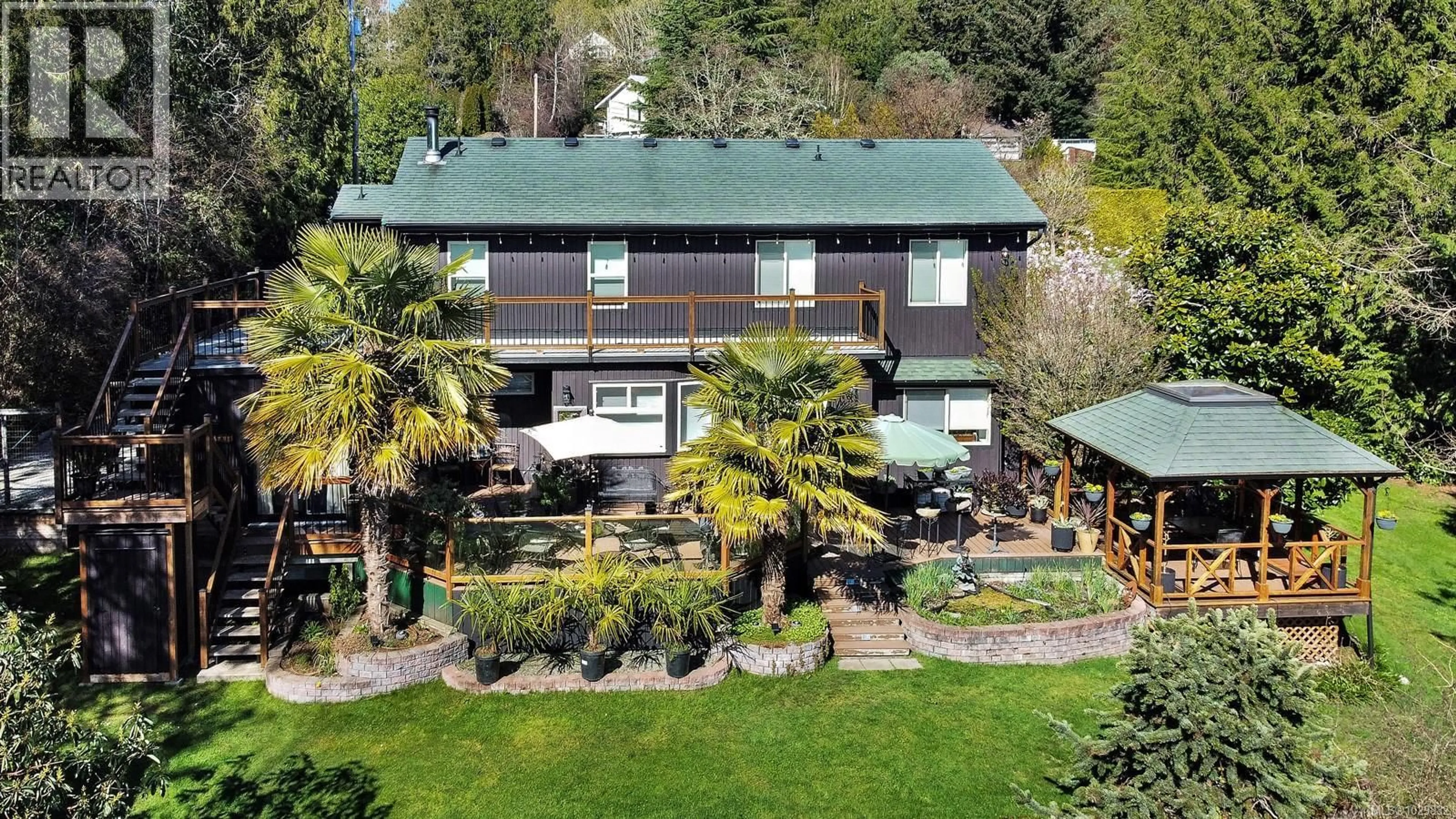 A pic from outside/outdoor area/front of a property/back of a property/a pic from drone, mountain view for 11007 CEDAR LANE, North Saanich British Columbia V8L5R1