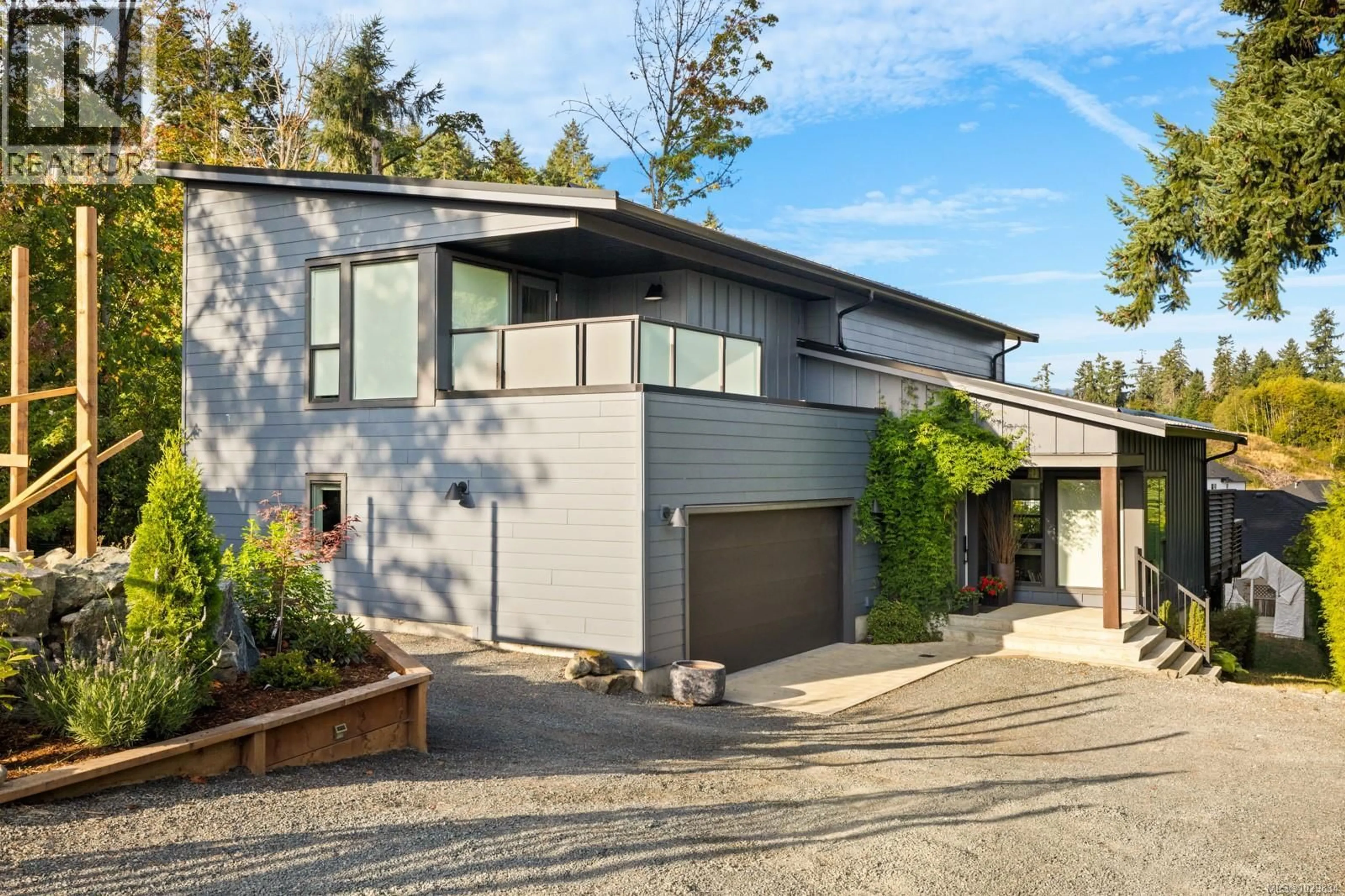 Home with vinyl exterior material, street for 1784 VEE ROAD, Cowichan Bay British Columbia V0R1N1