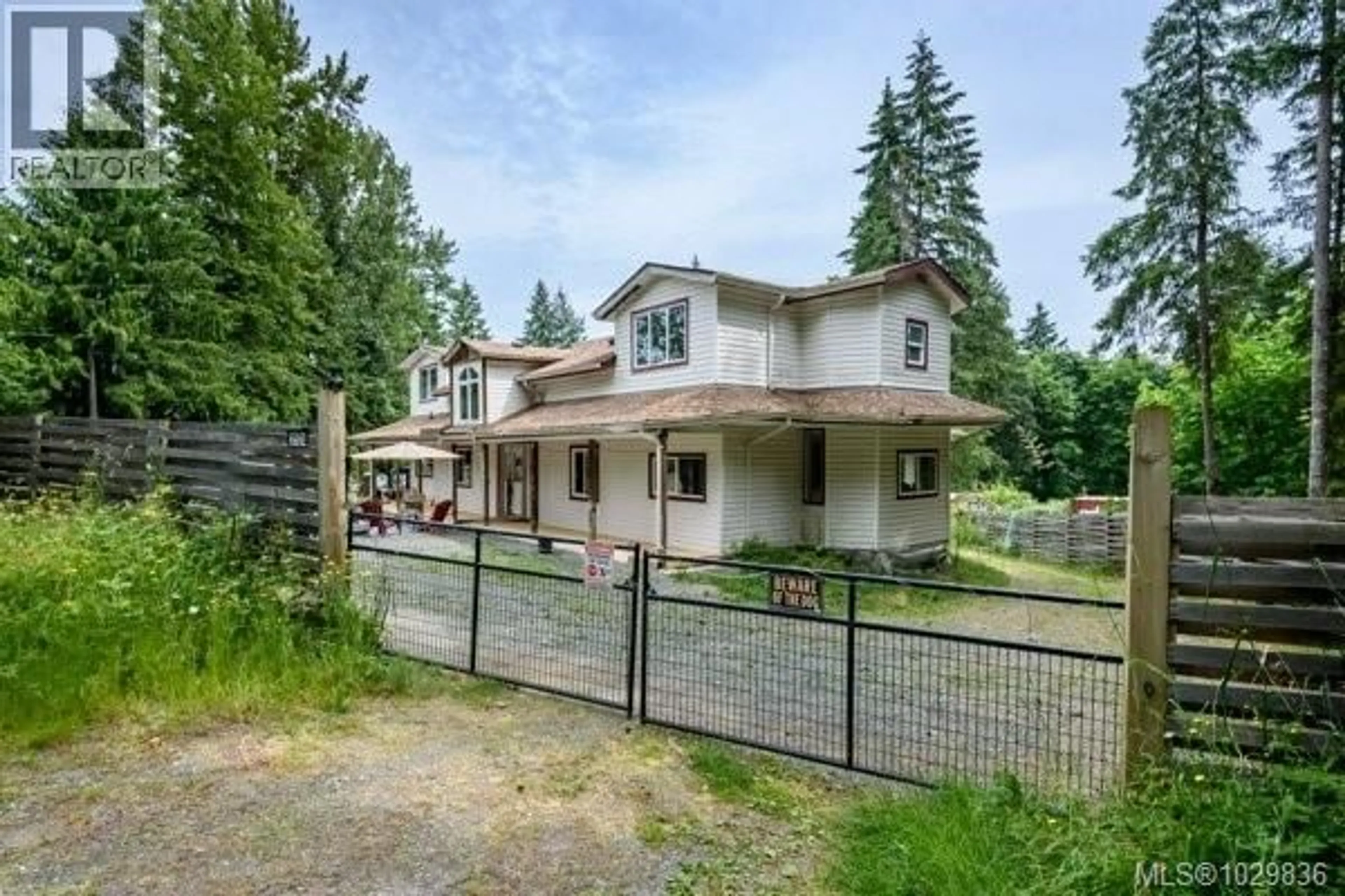 A pic from outside/outdoor area/front of a property/back of a property/a pic from drone, street for 2524 MACAULAY ROAD, Black Creek British Columbia V9J1B5