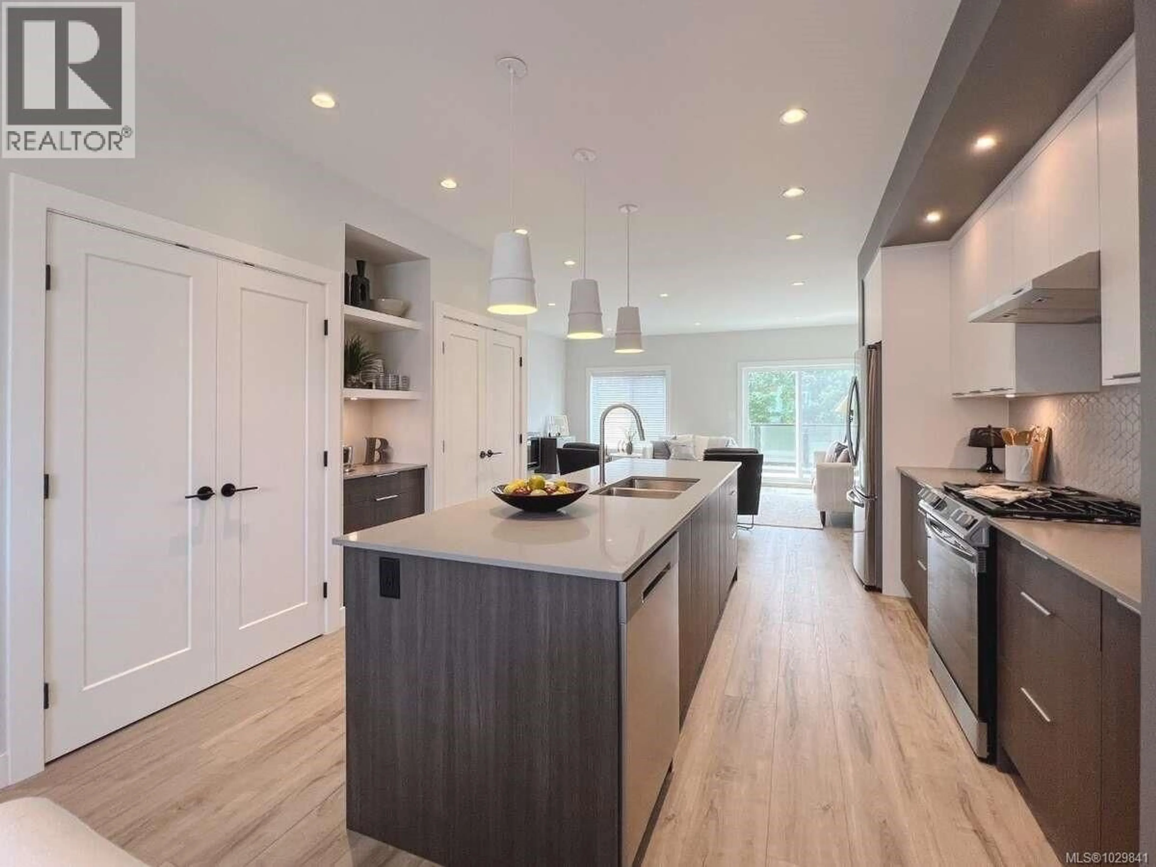 Open concept kitchen, wood/laminate floor for 11 - 2310 GUTHRIE ROAD, Comox British Columbia V9M0C6