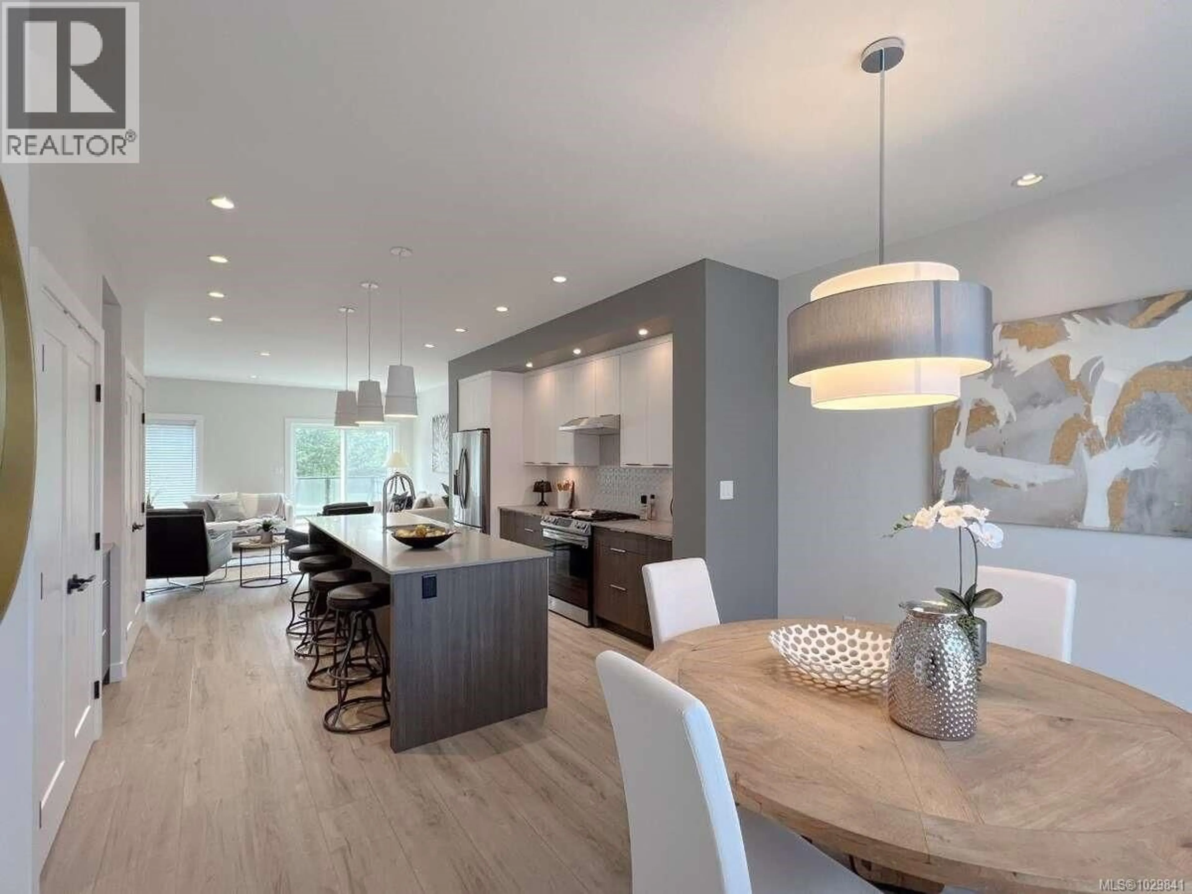 Open concept kitchen, wood/laminate floor for 11 - 2310 GUTHRIE ROAD, Comox British Columbia V9M0C6