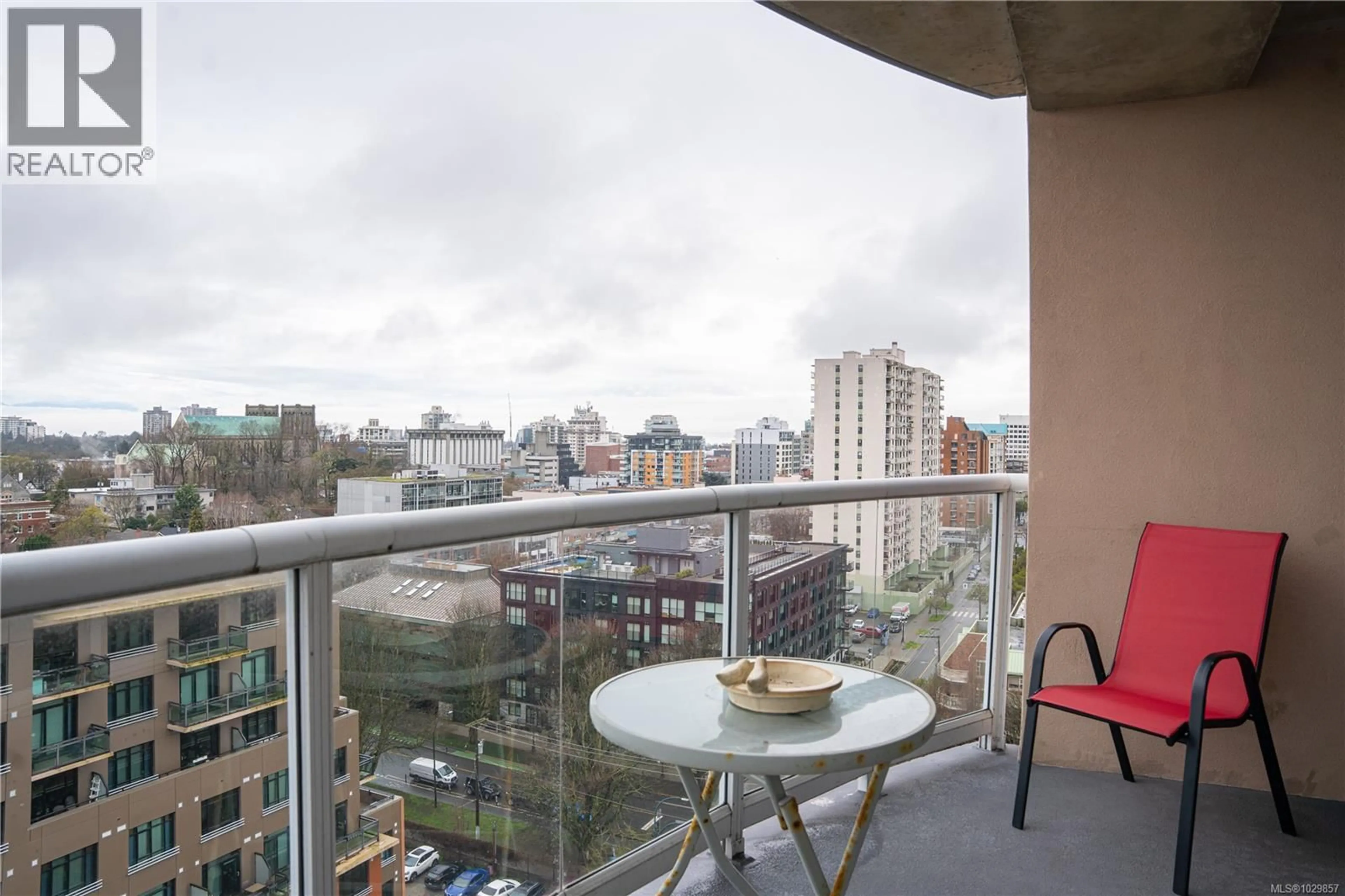Balcony in the apartment, city buildings view from balcony for 1401 - 1020 VIEW STREET, Victoria British Columbia V8V4Y4