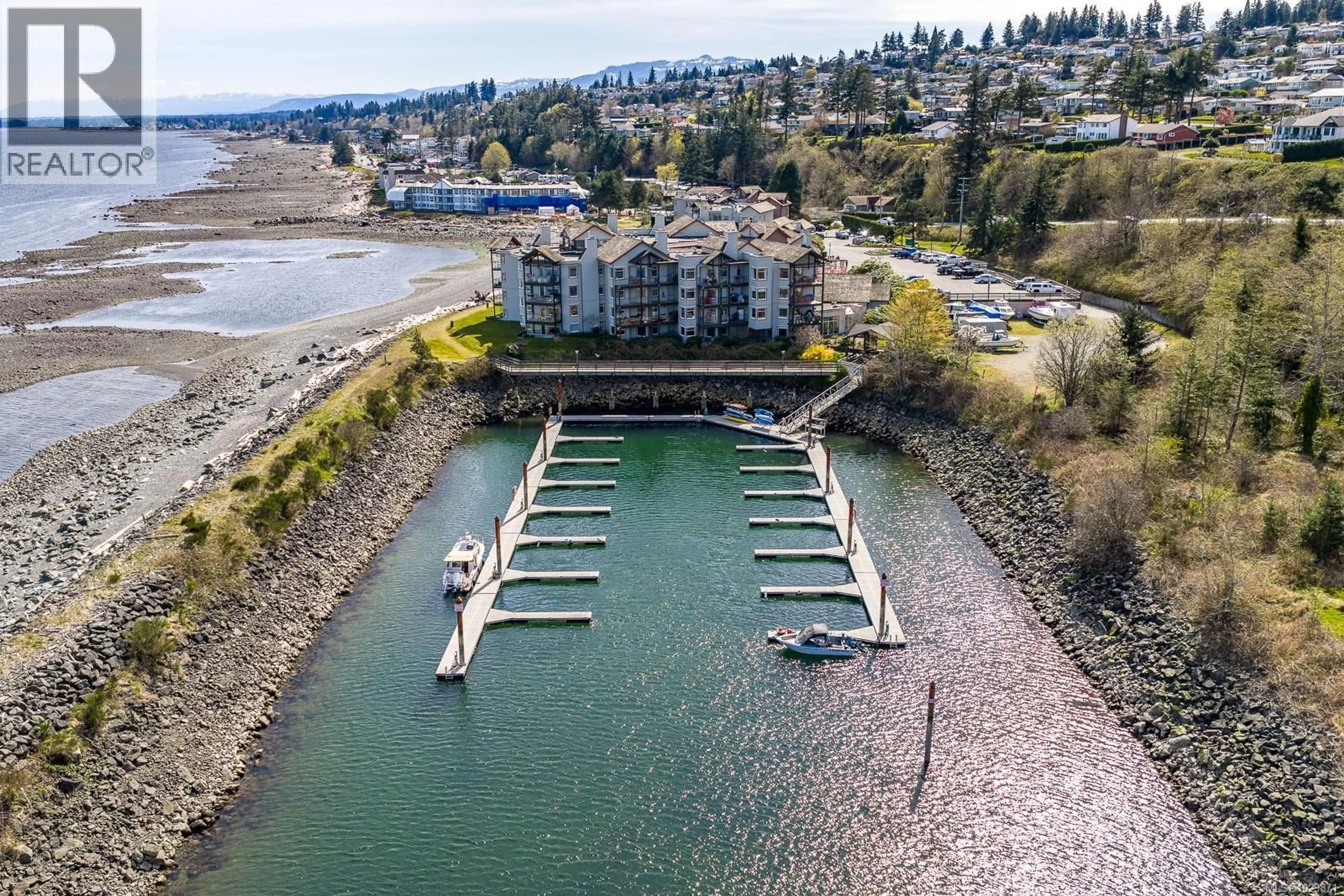 A pic from outside/outdoor area/front of a property/back of a property/a pic from drone, water/lake/river/ocean view for 3303 - 27 ISLAND HIGHWAY SOUTH, Campbell River British Columbia V9W1A2