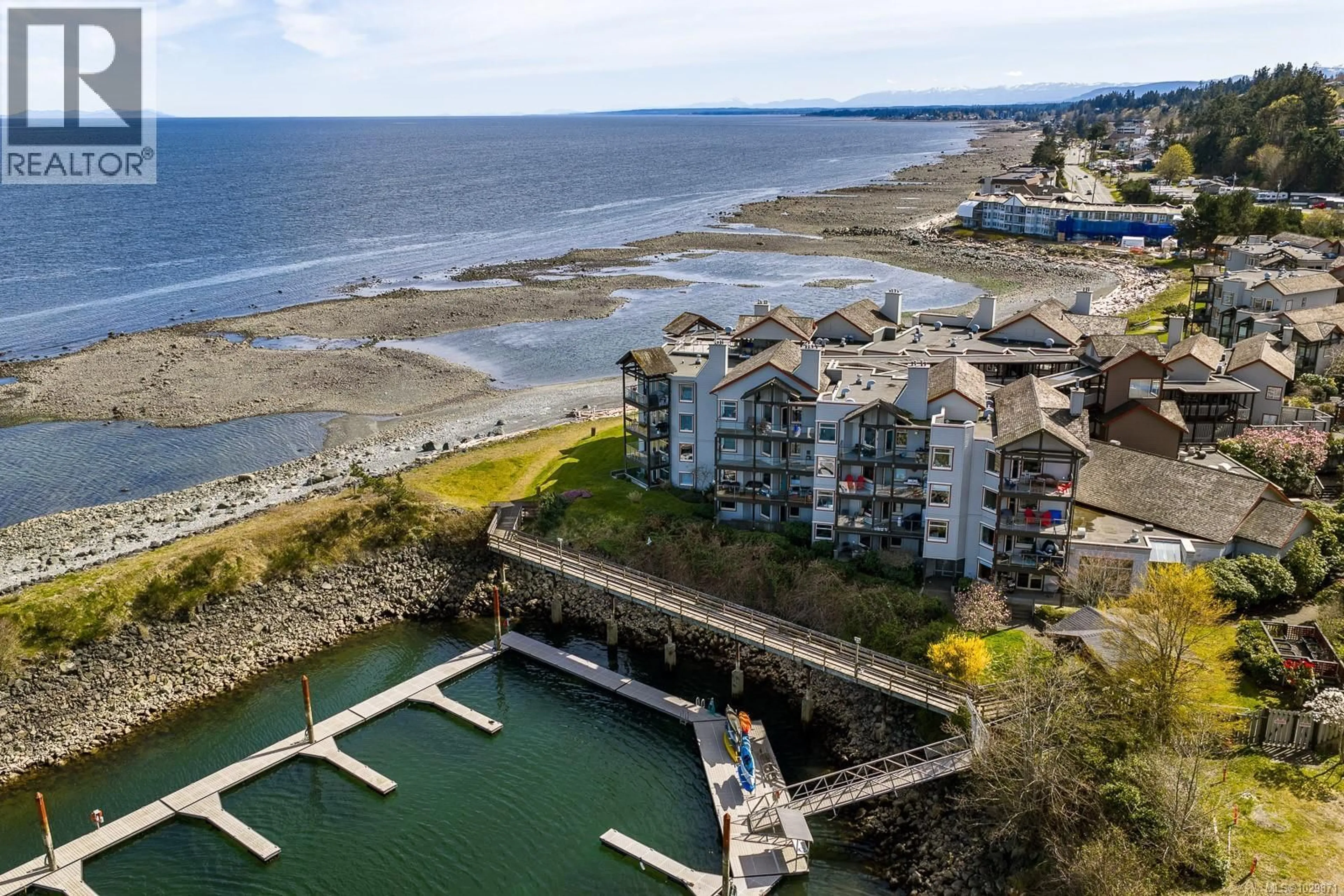 A pic from outside/outdoor area/front of a property/back of a property/a pic from drone, water/lake/river/ocean view for 3303 - 27 ISLAND HIGHWAY SOUTH, Campbell River British Columbia V9W1A2