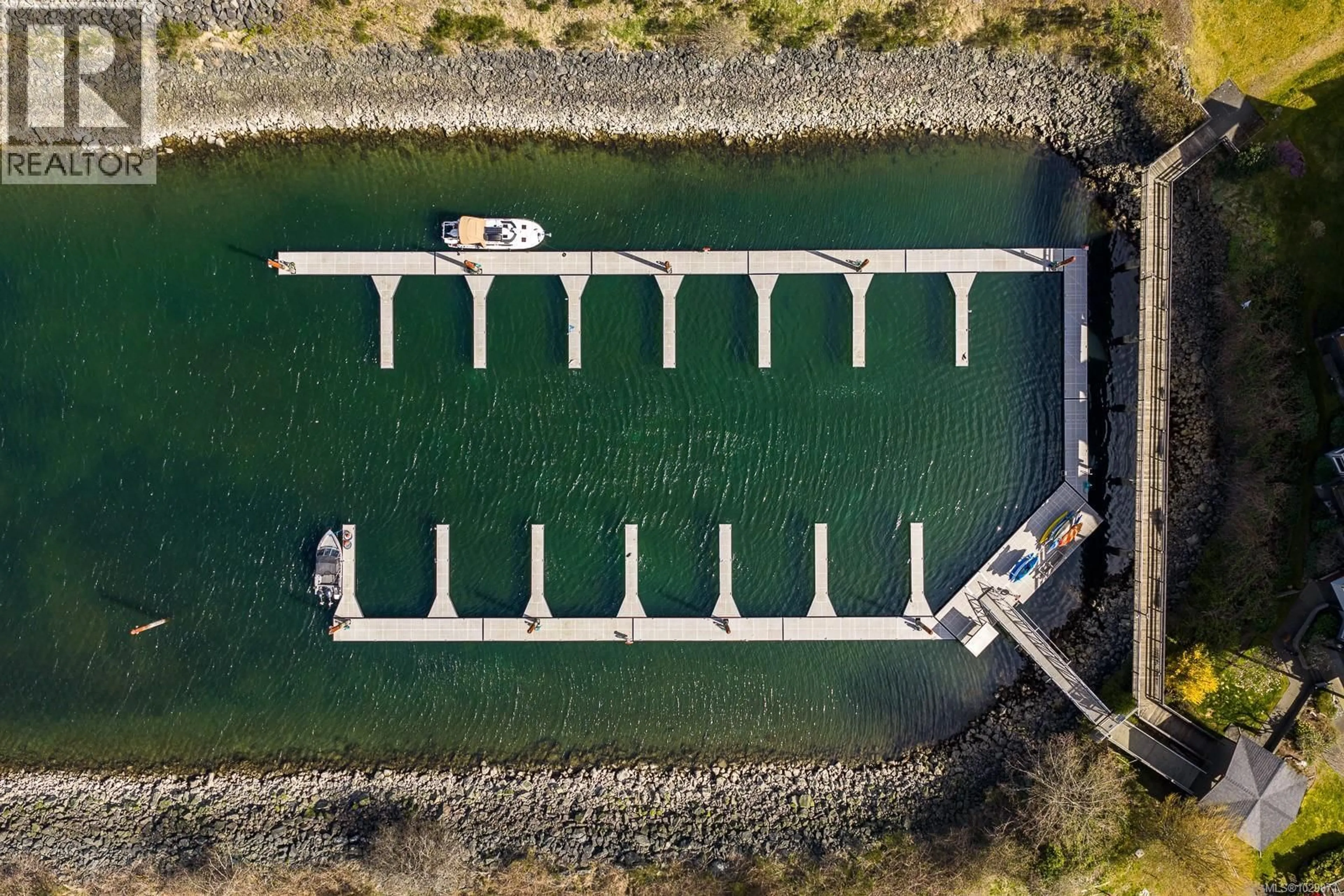A pic from outside/outdoor area/front of a property/back of a property/a pic from drone, water/lake/river/ocean view for 3303 - 27 ISLAND HIGHWAY SOUTH, Campbell River British Columbia V9W1A2