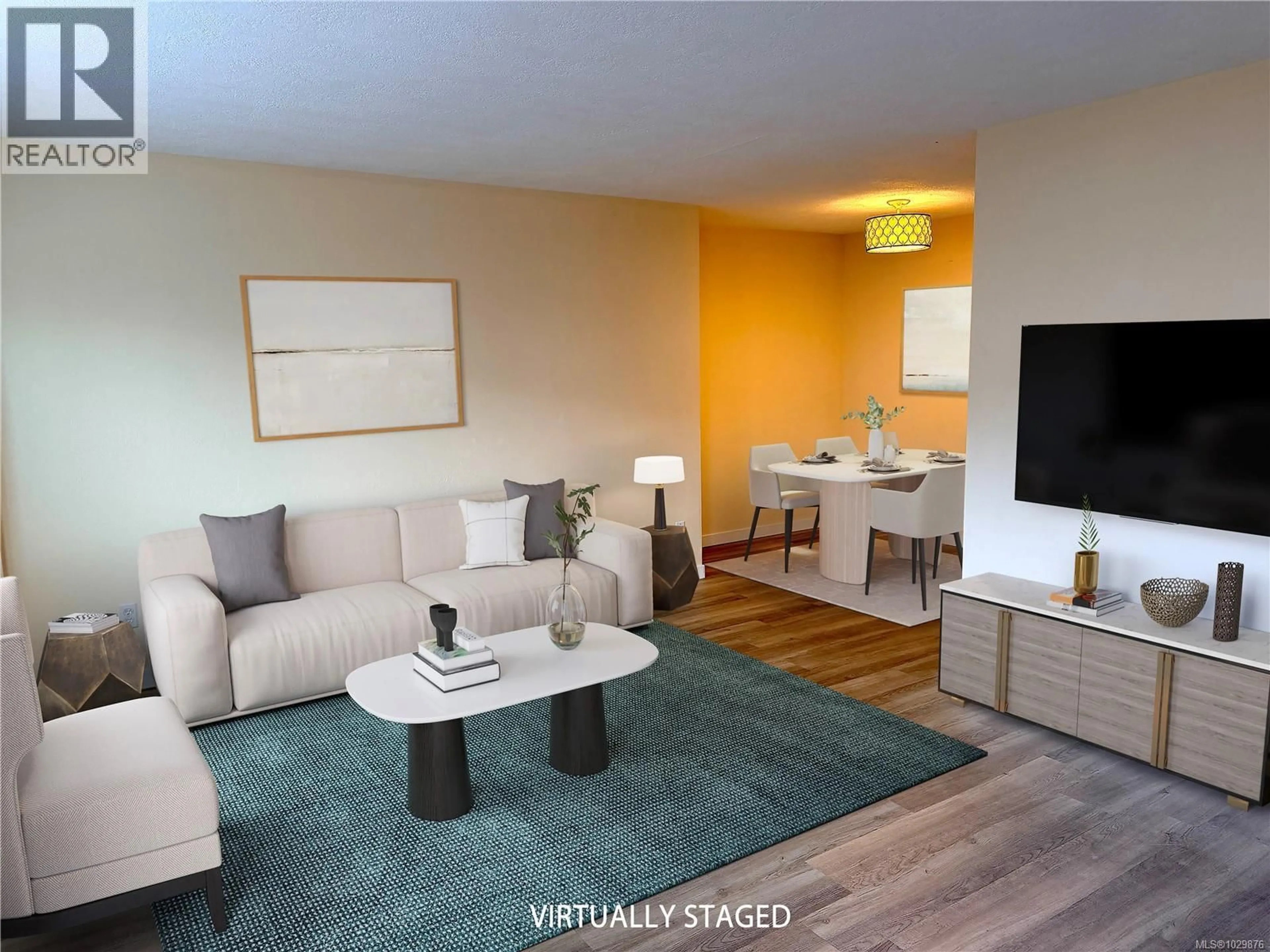 Living room with furniture, wood/laminate floor for 103 - 2425 LEWIS STREET, Duncan British Columbia V9L2Z1