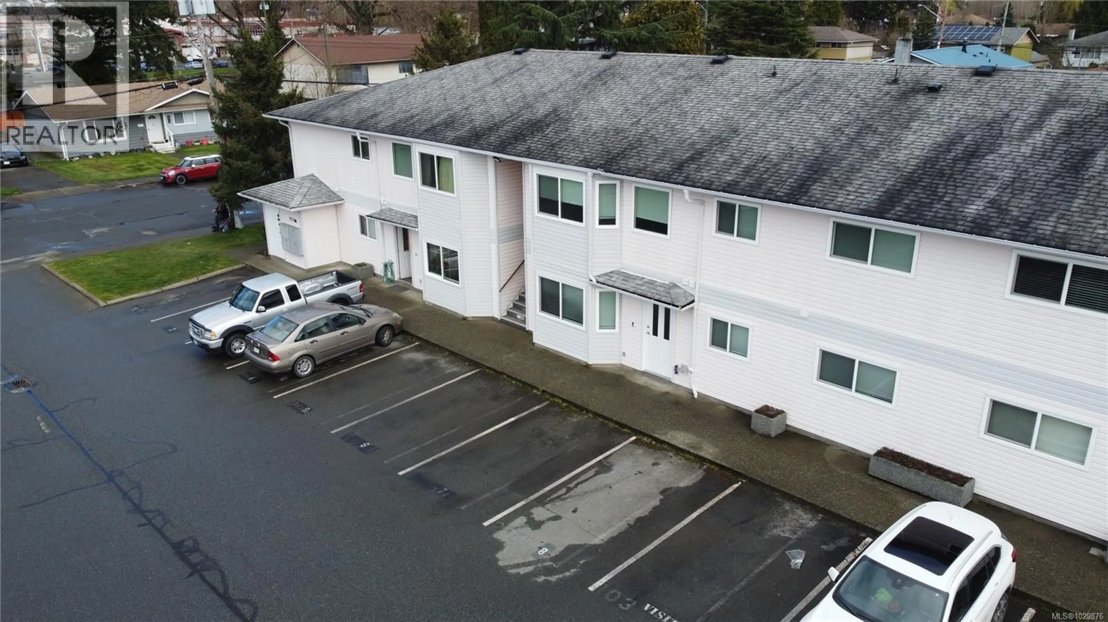 A pic from outside/outdoor area/front of a property/back of a property/a pic from drone, building for 103 - 2425 LEWIS STREET, Duncan British Columbia V9L2Z1