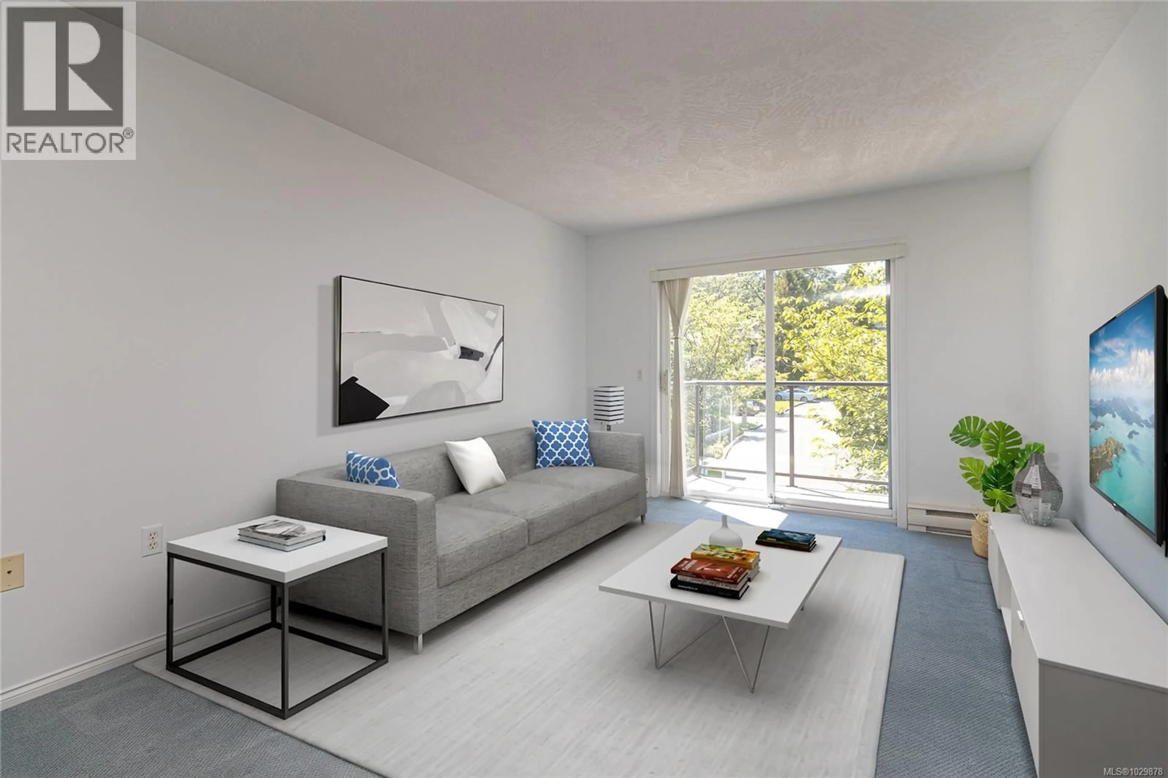 Living room with furniture, unknown for 202 - 1485 GARNET ROAD, Saanich British Columbia V8P5T5