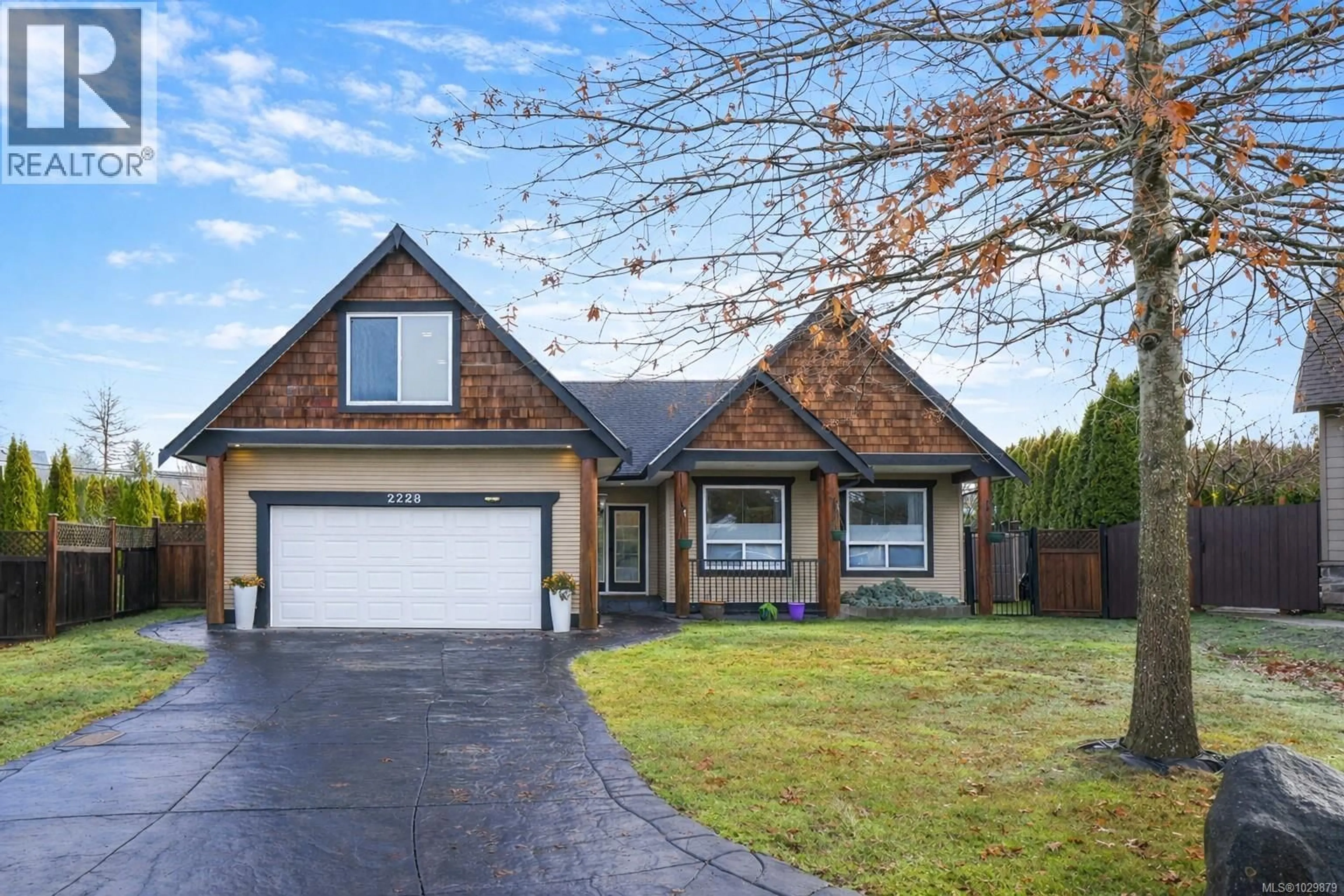 Home with brick exterior material, street for 2228 SWALLOW CRESCENT, Courtenay British Columbia V9N9W5