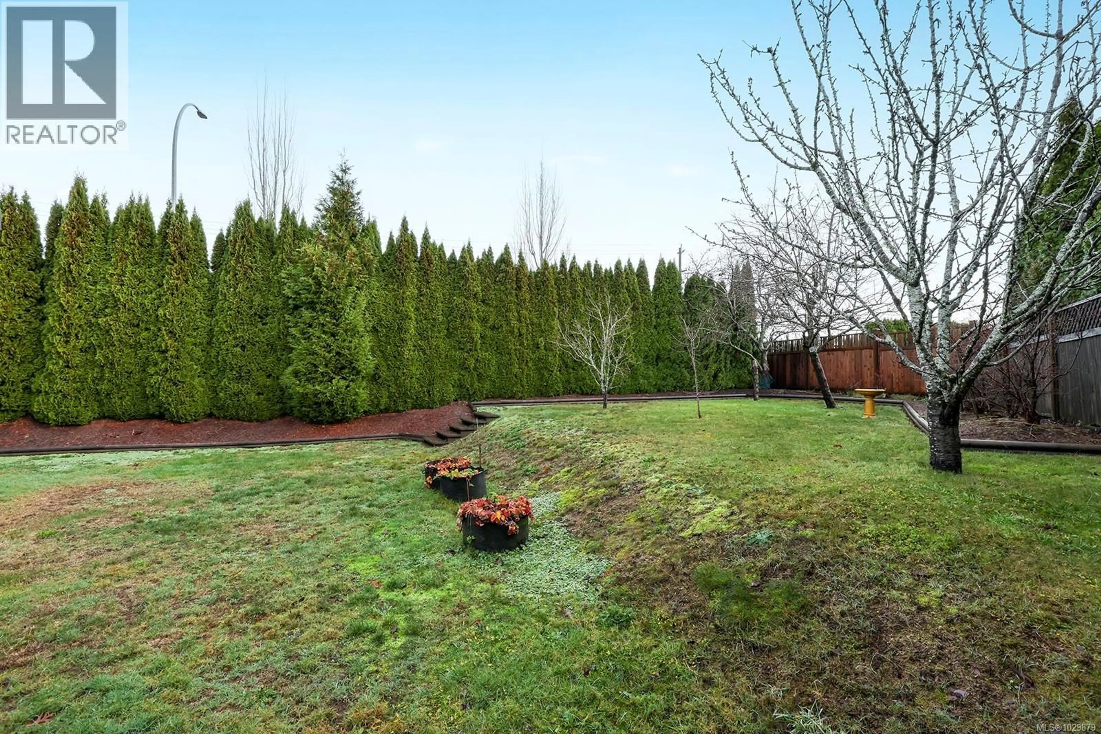 Patio, forest/trees view for 2228 SWALLOW CRESCENT, Courtenay British Columbia V9N9W5