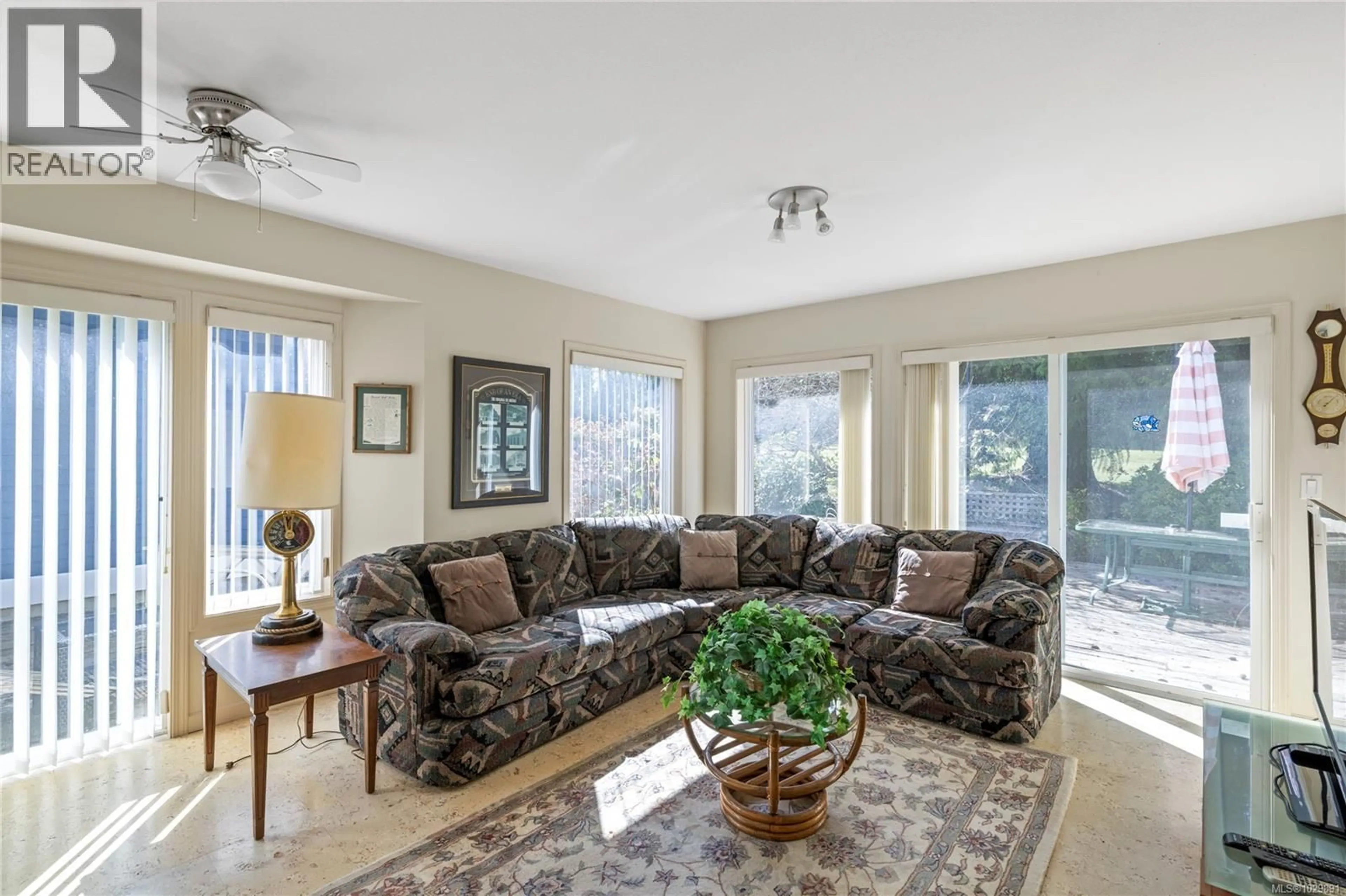 Living room with furniture, unknown for 626 WINDWARD WAY, Qualicum Beach British Columbia V9K2K4