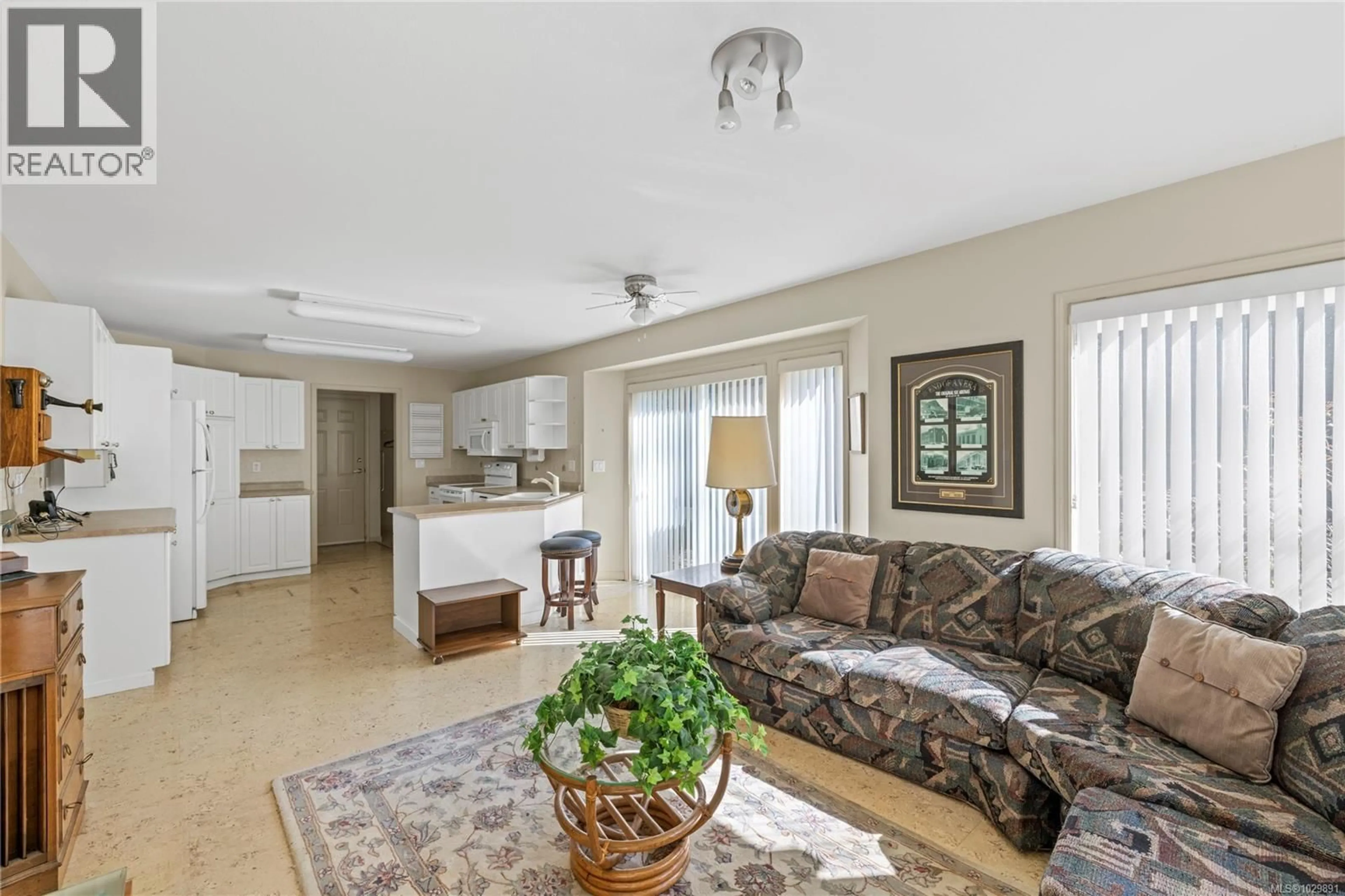 Living room with furniture, unknown for 626 WINDWARD WAY, Qualicum Beach British Columbia V9K2K4