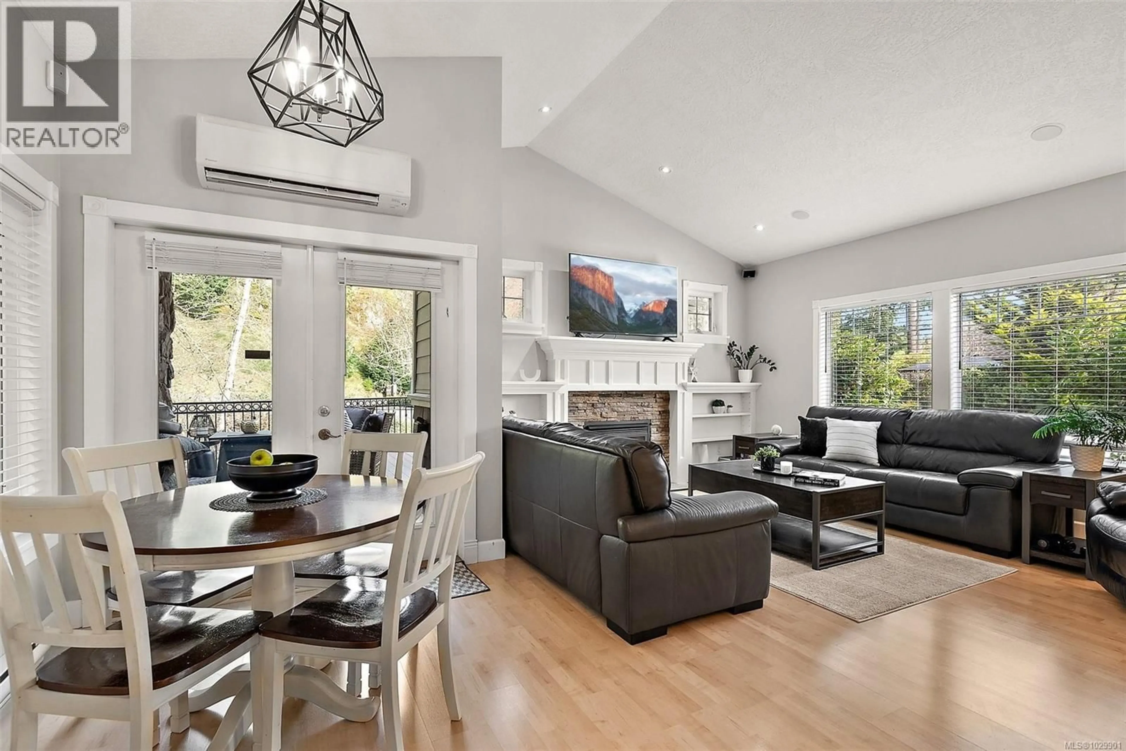 Living room with furniture, wood/laminate floor for 2138 STONE GATE, Langford British Columbia V9B6R5