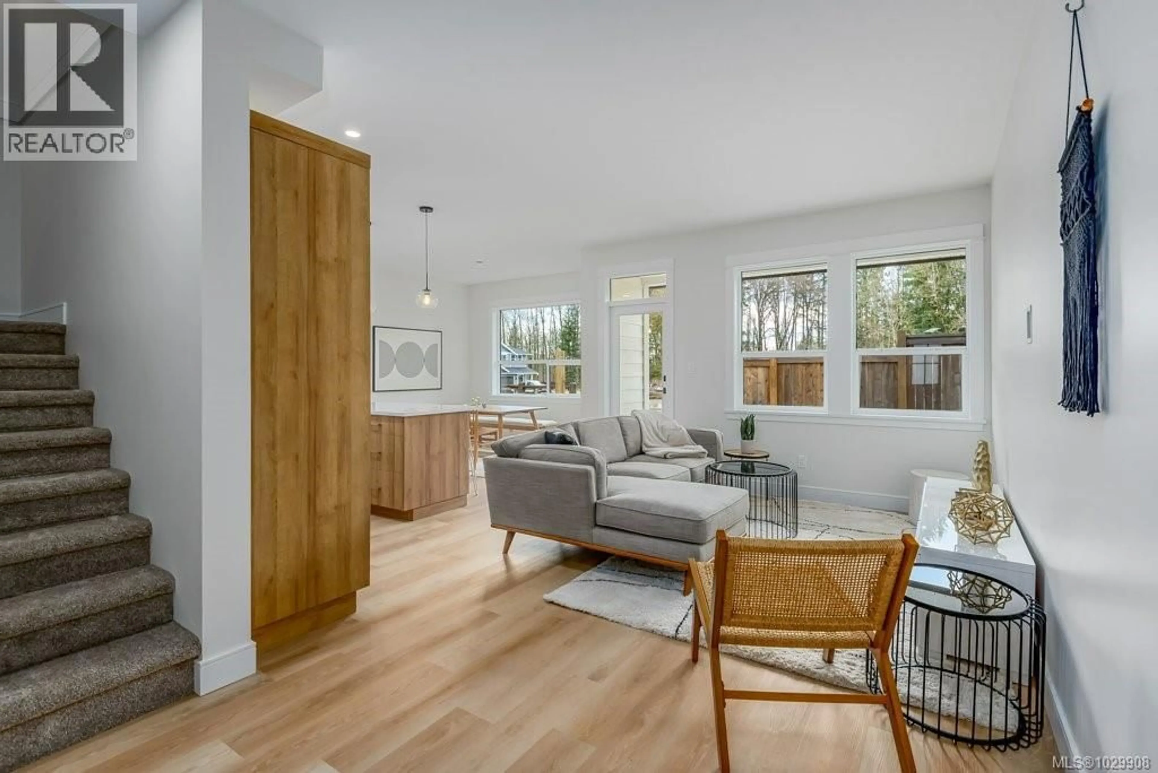 Living room with furniture, wood/laminate floor for 205 - 2580 BROOKFIELD DRIVE, Courtenay British Columbia V9N0J8