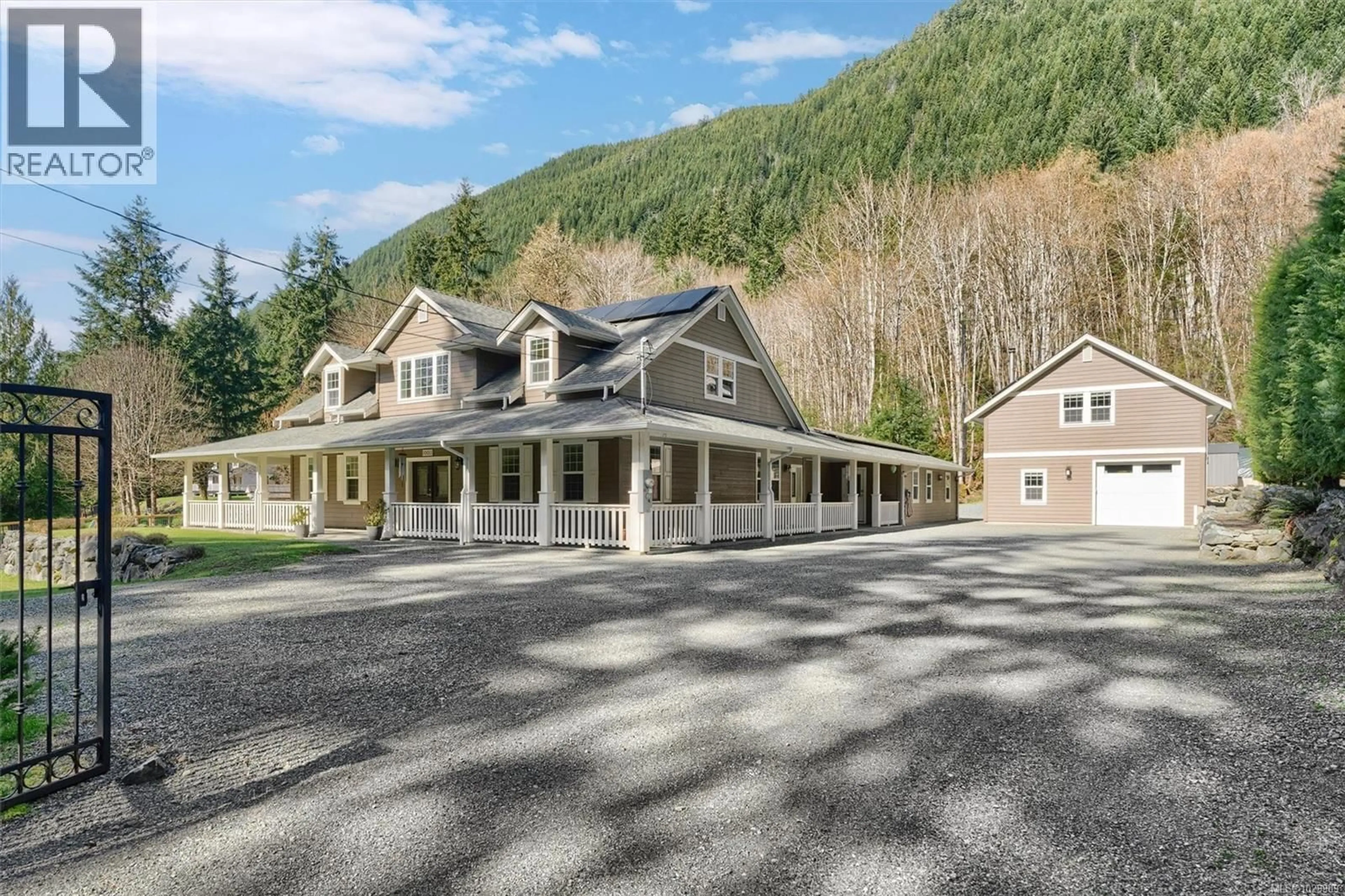 A pic from outside/outdoor area/front of a property/back of a property/a pic from drone, mountain view for 10011 YOUBOU ROAD, Youbou British Columbia V0R3E1