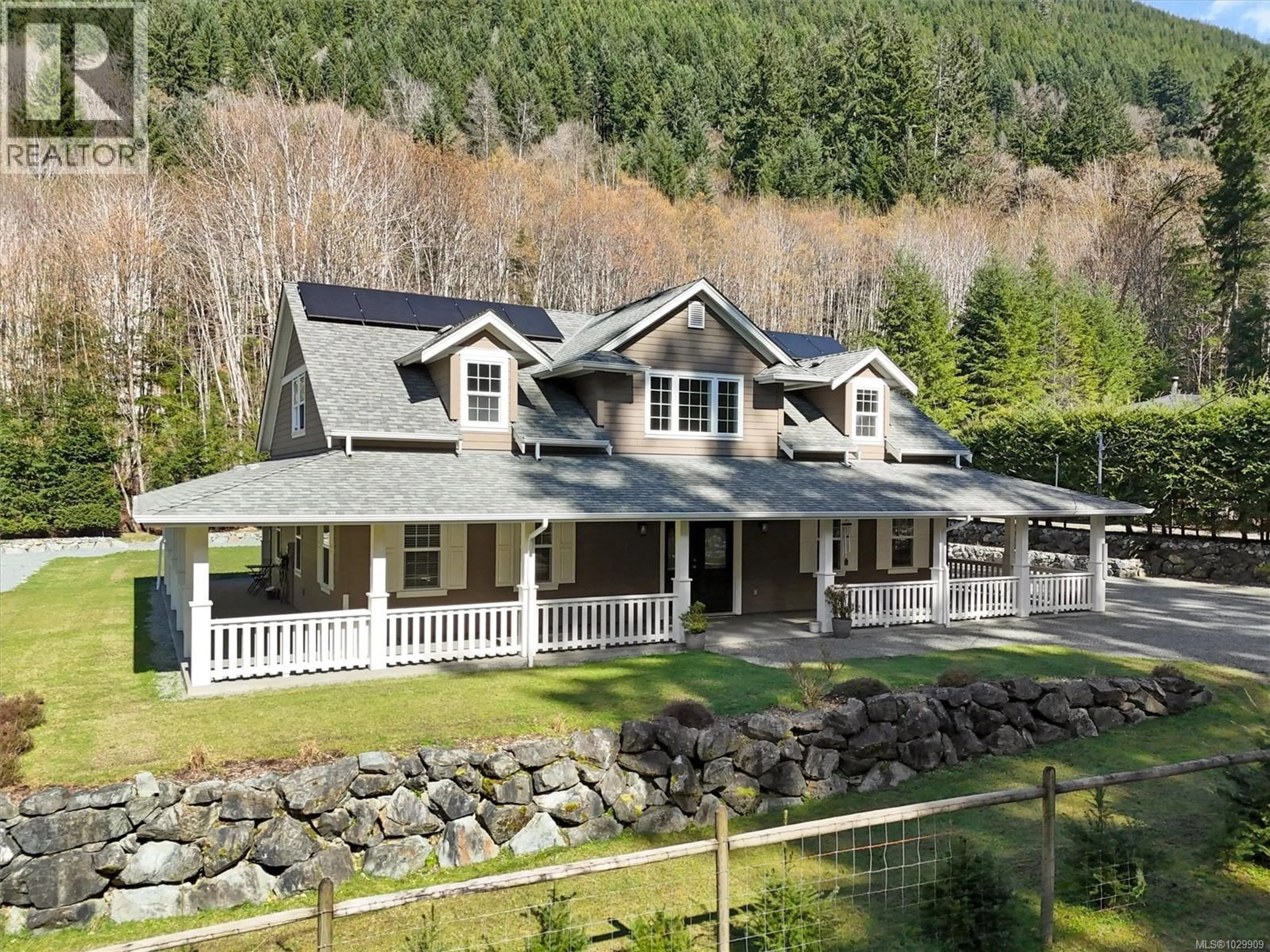 A pic from outside/outdoor area/front of a property/back of a property/a pic from drone, mountain view for 10011 YOUBOU ROAD, Youbou British Columbia V0R3E1