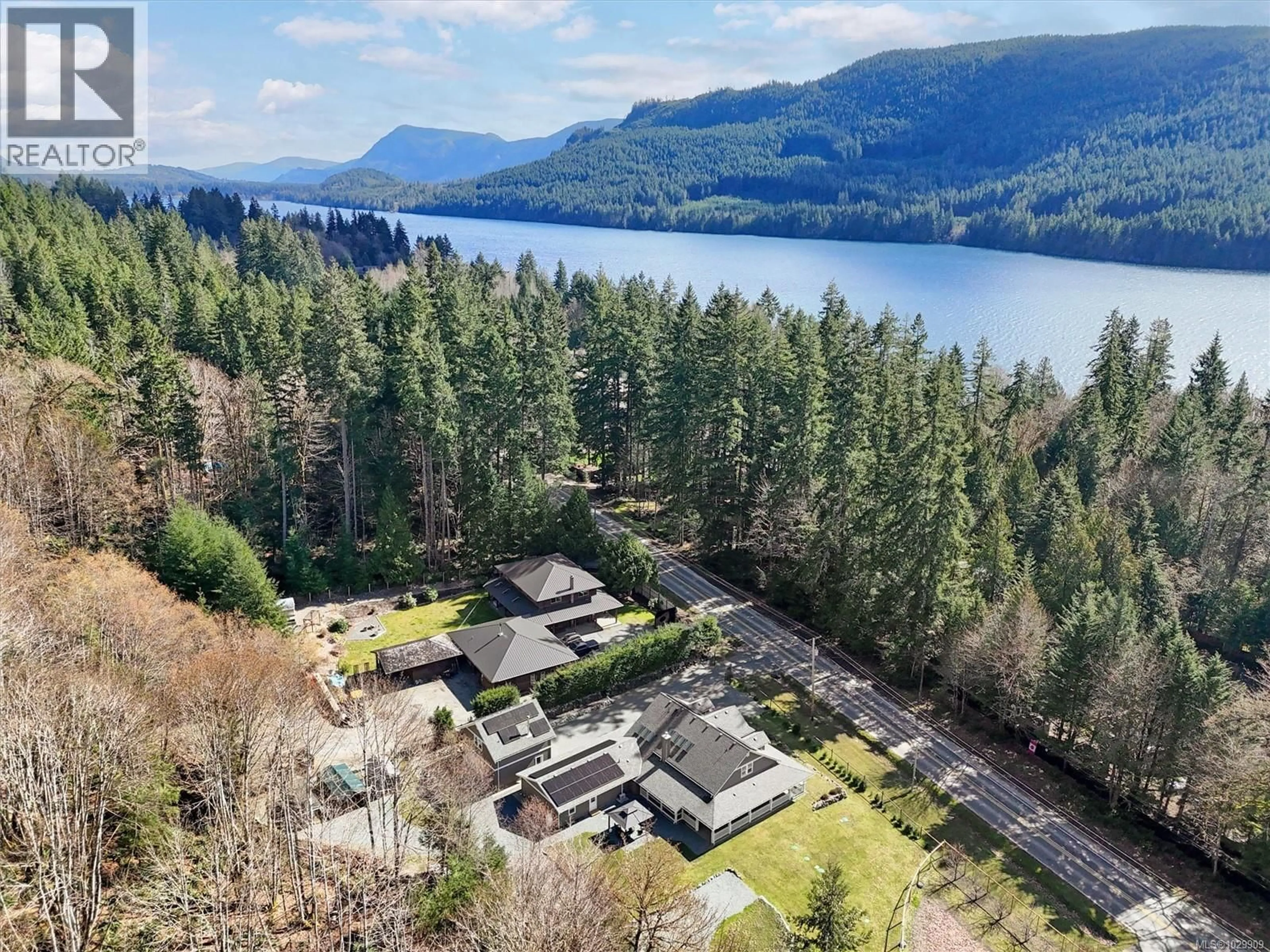 A pic from outside/outdoor area/front of a property/back of a property/a pic from drone, water/lake/river/ocean view for 10011 YOUBOU ROAD, Youbou British Columbia V0R3E1