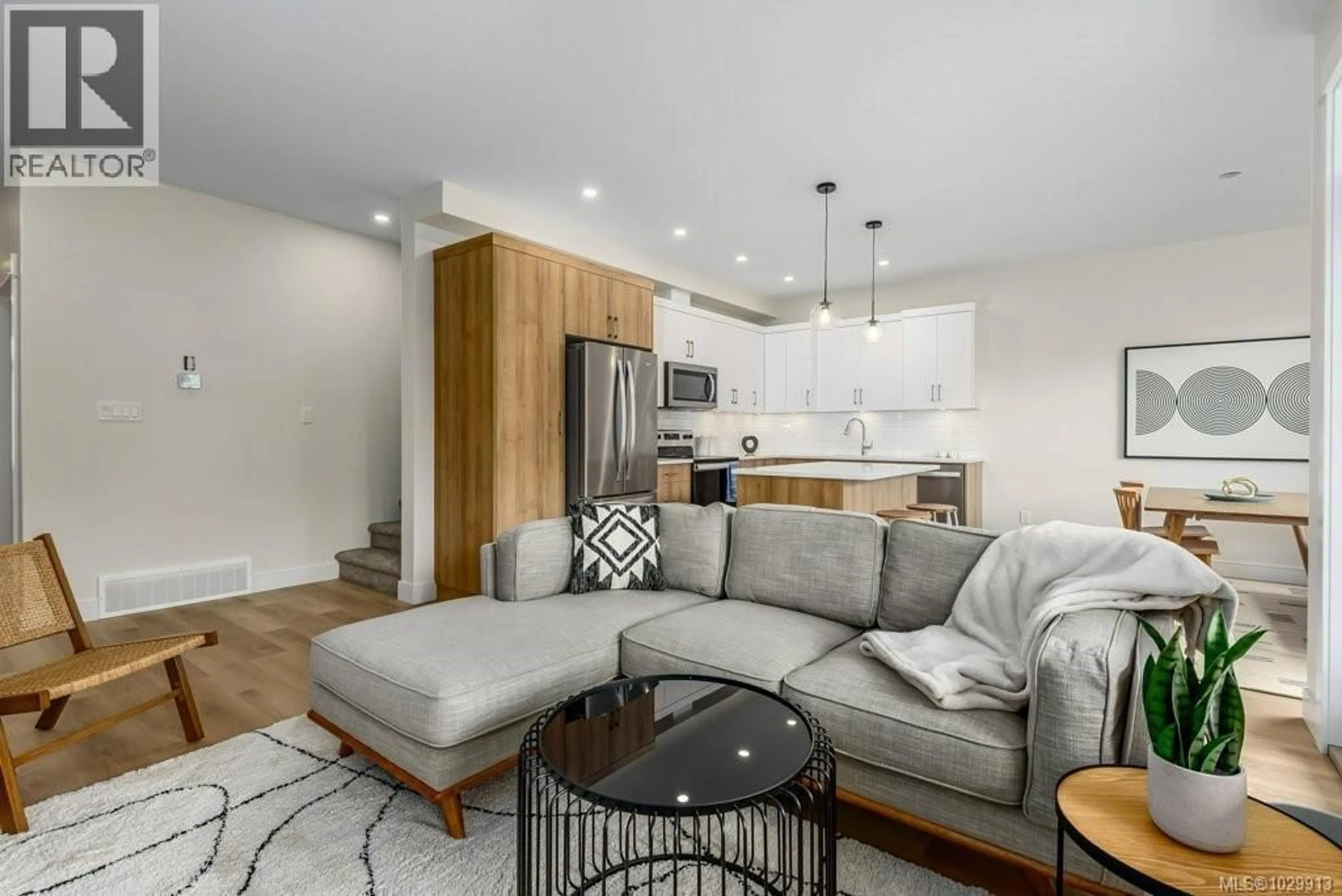 Living room with furniture, wood/laminate floor for 203 - 2580 BROOKFIELD DRIVE, Courtenay British Columbia V9N0J8