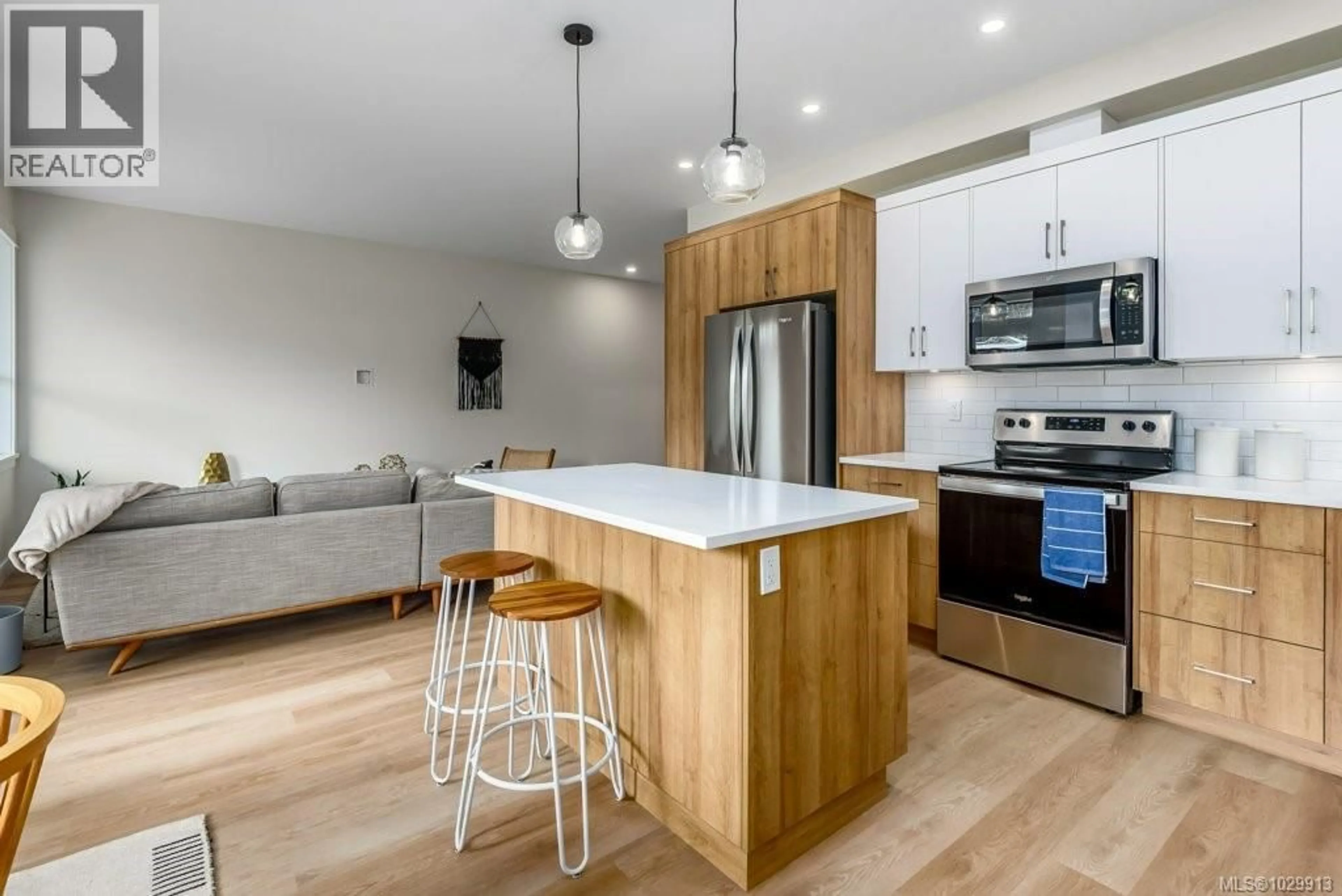 Open concept kitchen, wood/laminate floor for 203 - 2580 BROOKFIELD DRIVE, Courtenay British Columbia V9N0J8