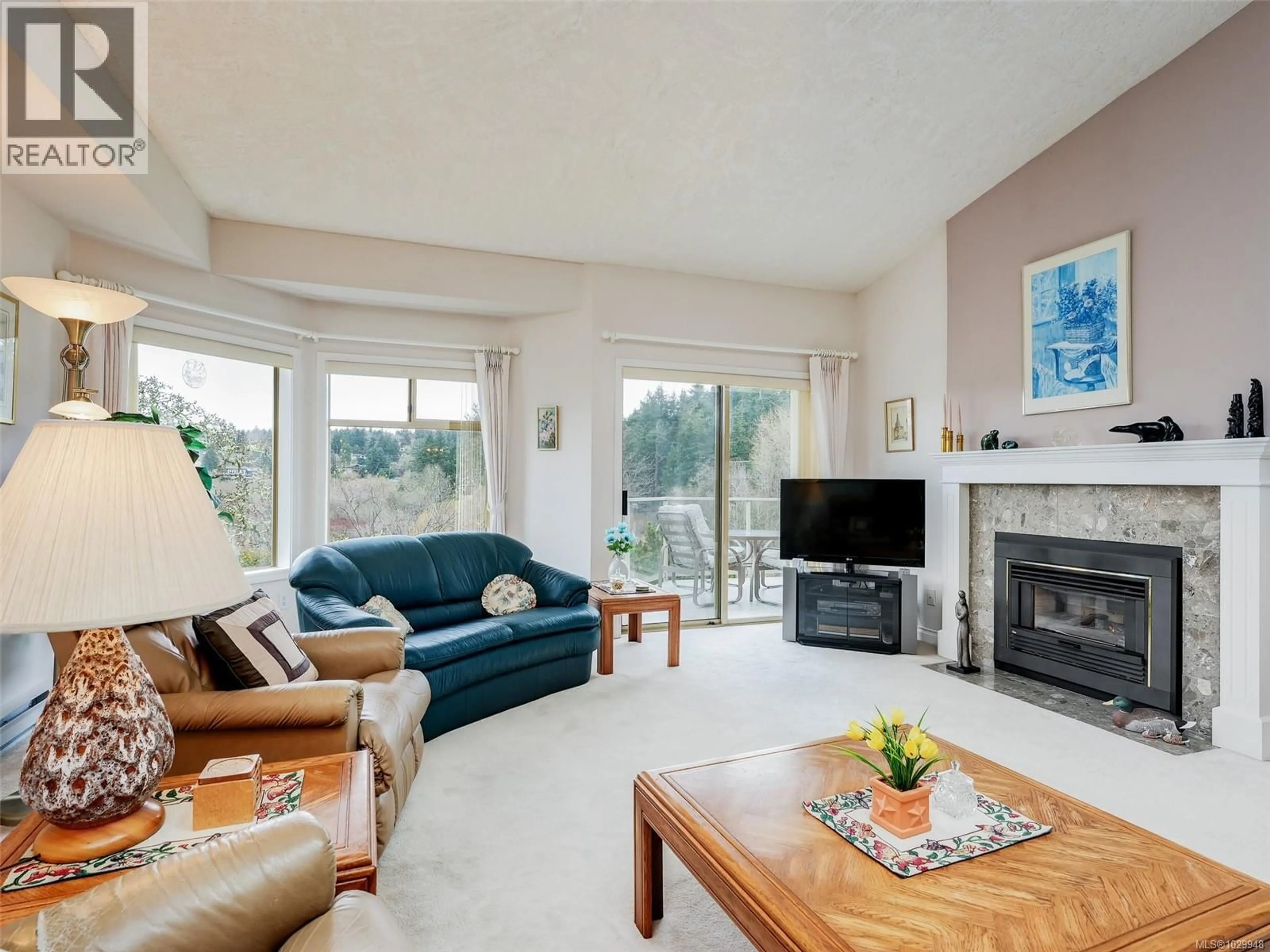 Living room with furniture, unknown for 19 - 4360 EMILY CARR DRIVE, Saanich British Columbia V8X4Y4