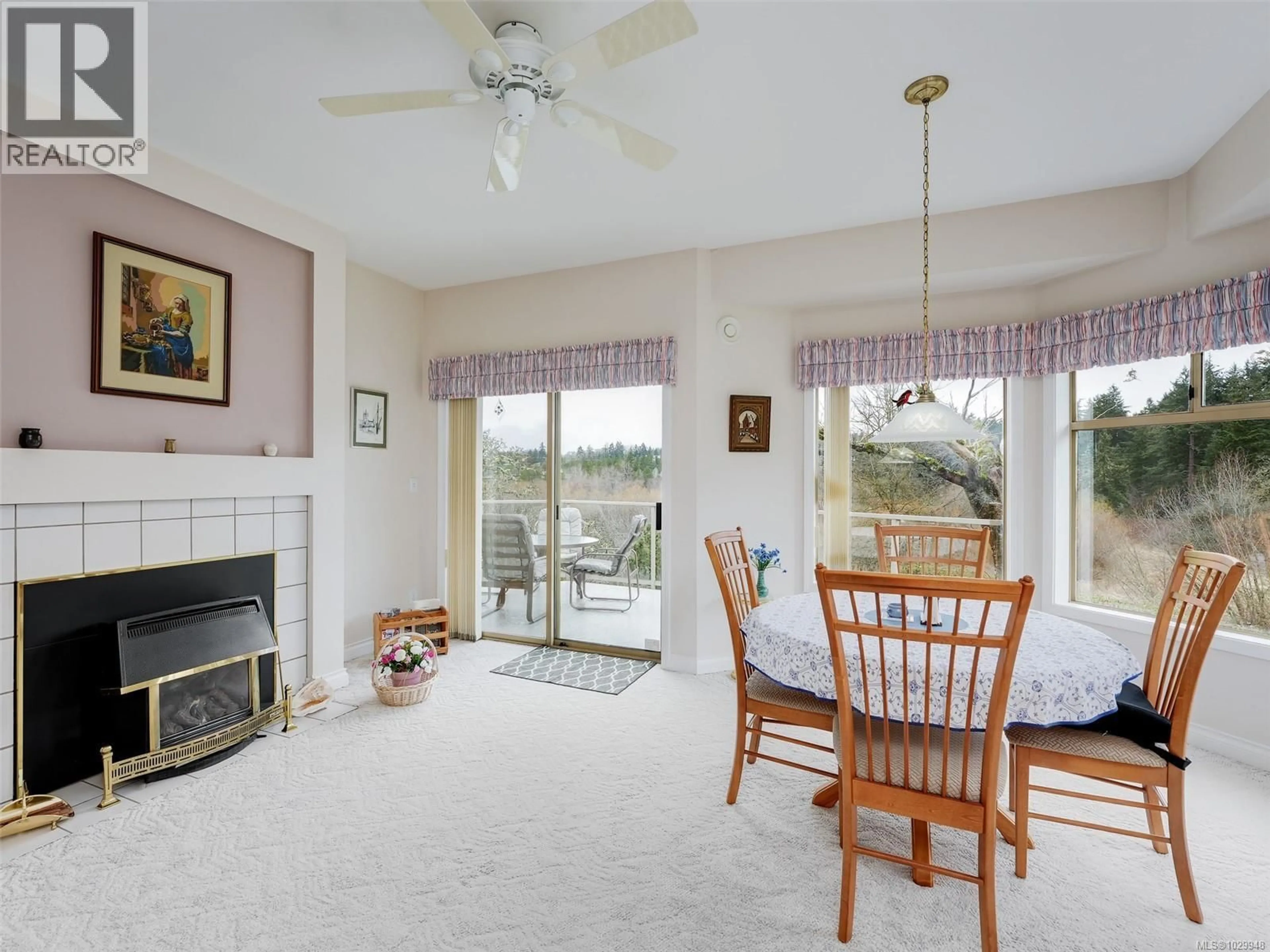 Living room with furniture, unknown for 19 - 4360 EMILY CARR DRIVE, Saanich British Columbia V8X4Y4