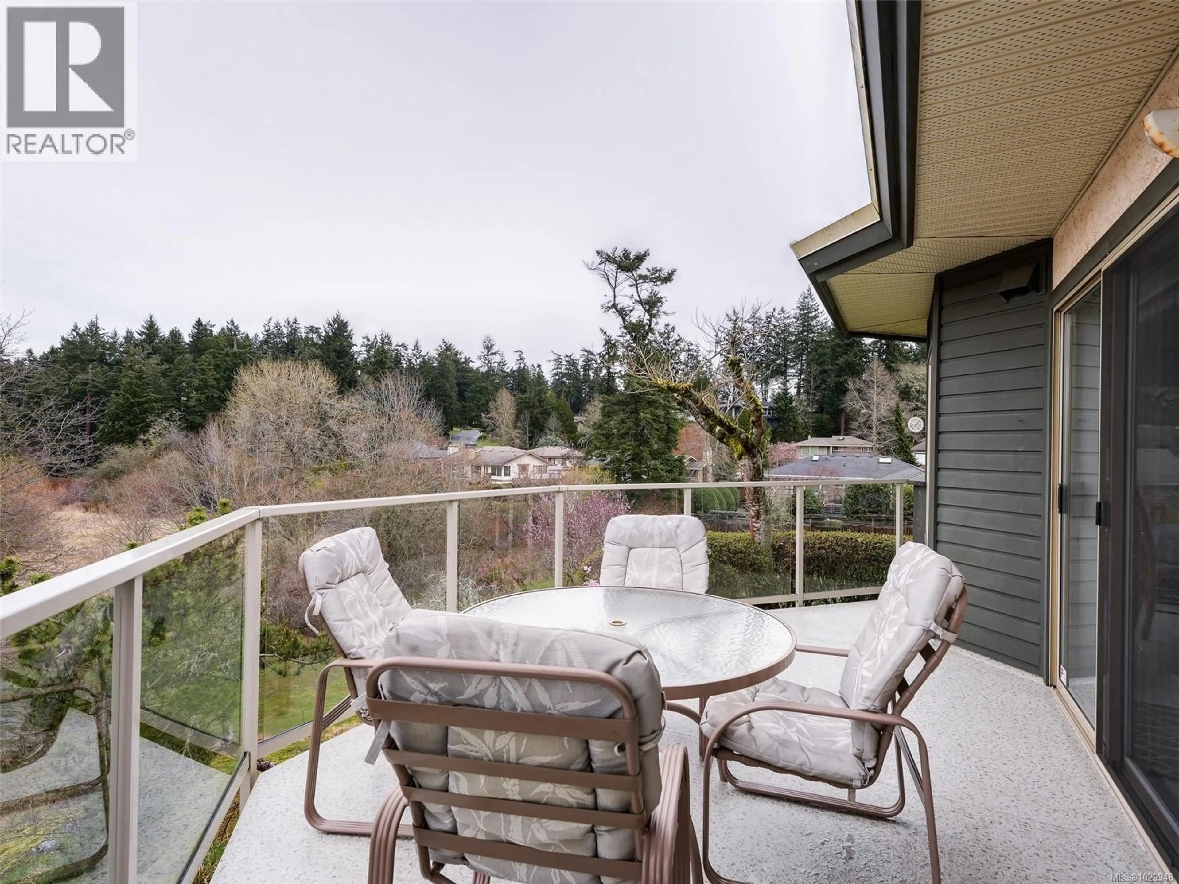 Patio, water/lake/river/ocean view for 19 - 4360 EMILY CARR DRIVE, Saanich British Columbia V8X4Y4