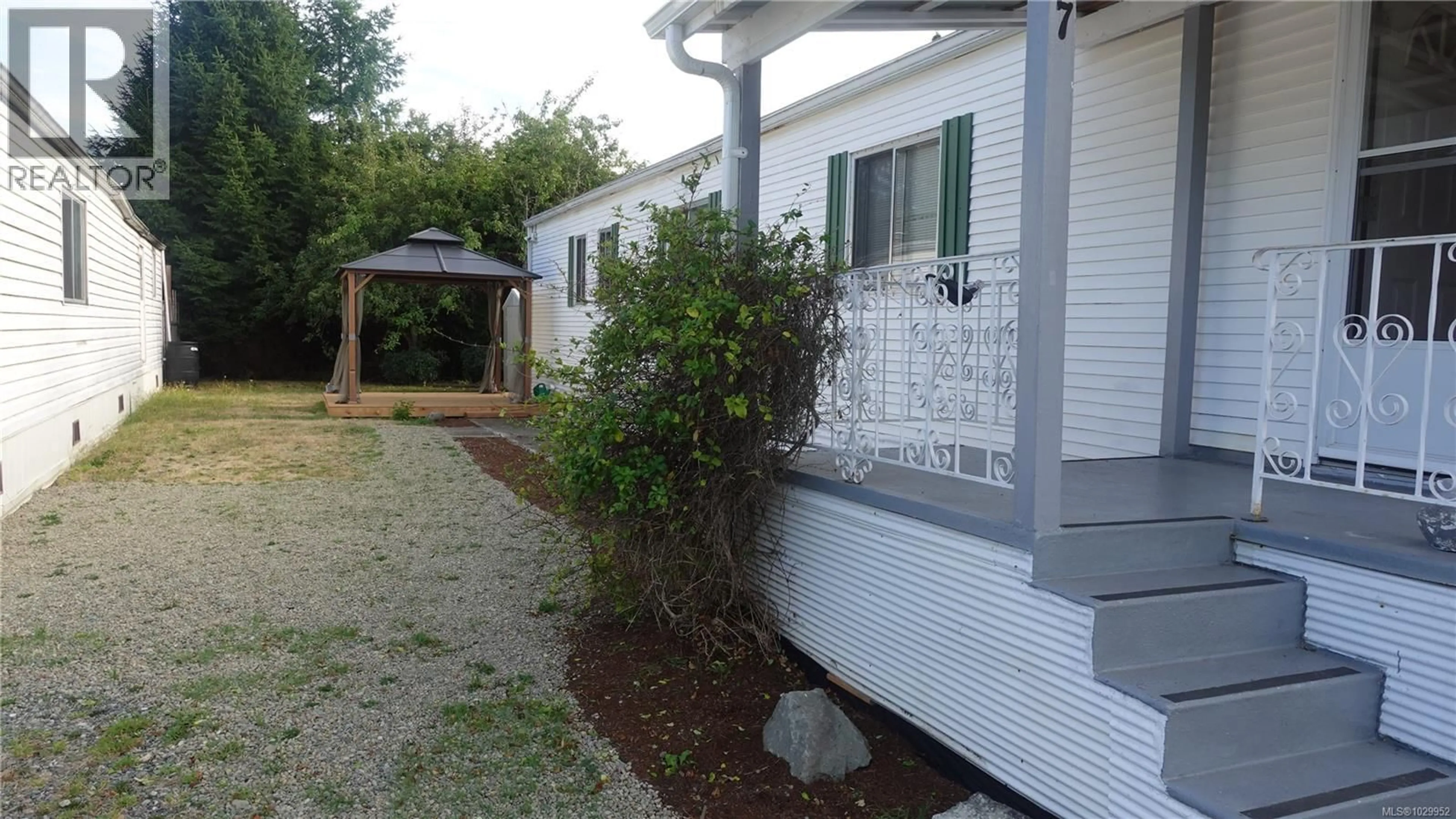 Home with vinyl exterior material, street for 7 - 6820 PARKLANDS PLACE, Lantzville British Columbia V0R2H0