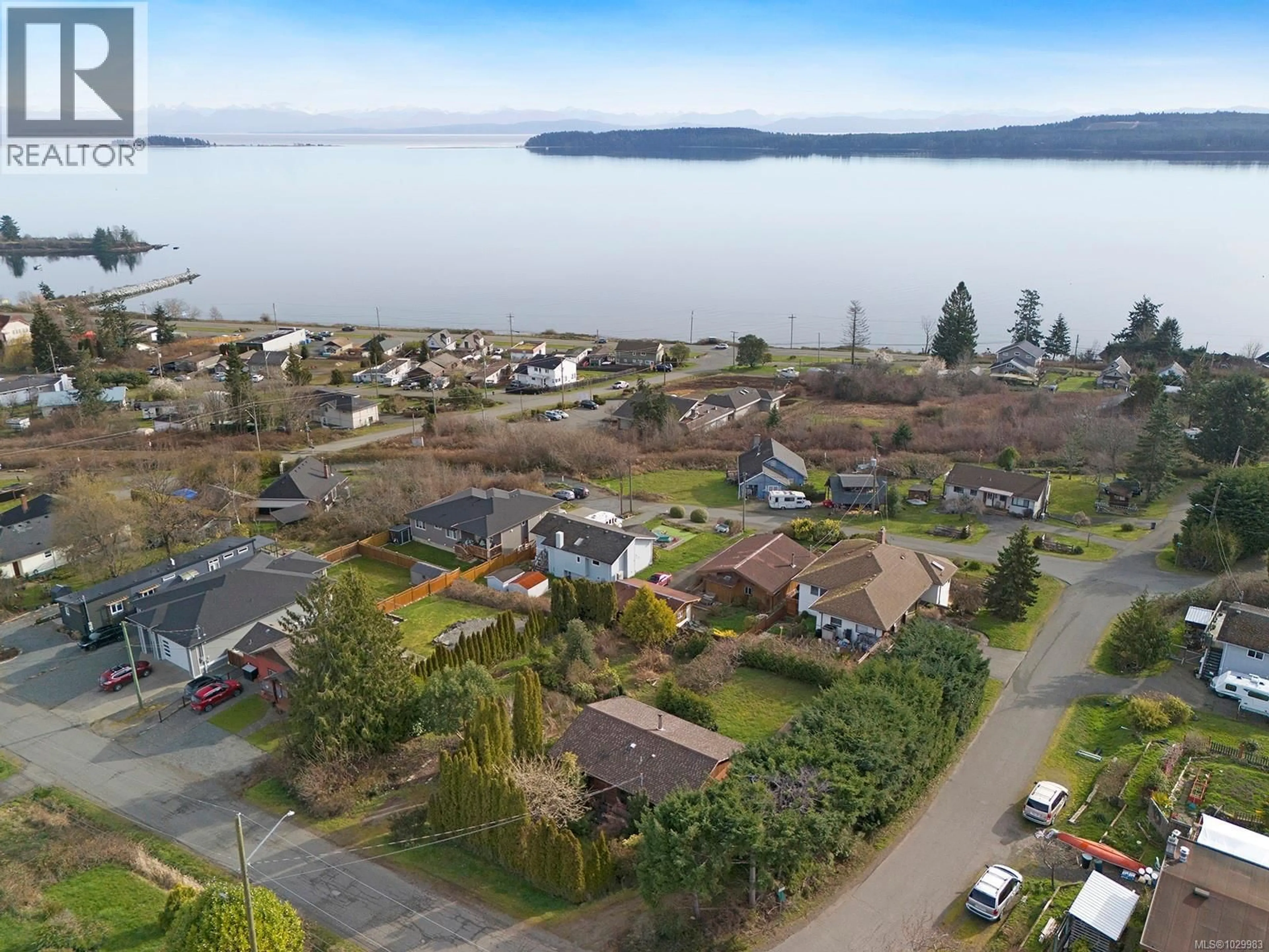 A pic from outside/outdoor area/front of a property/back of a property/a pic from drone, water/lake/river/ocean view for 5608 4TH STREET, Union Bay British Columbia V0R3B0