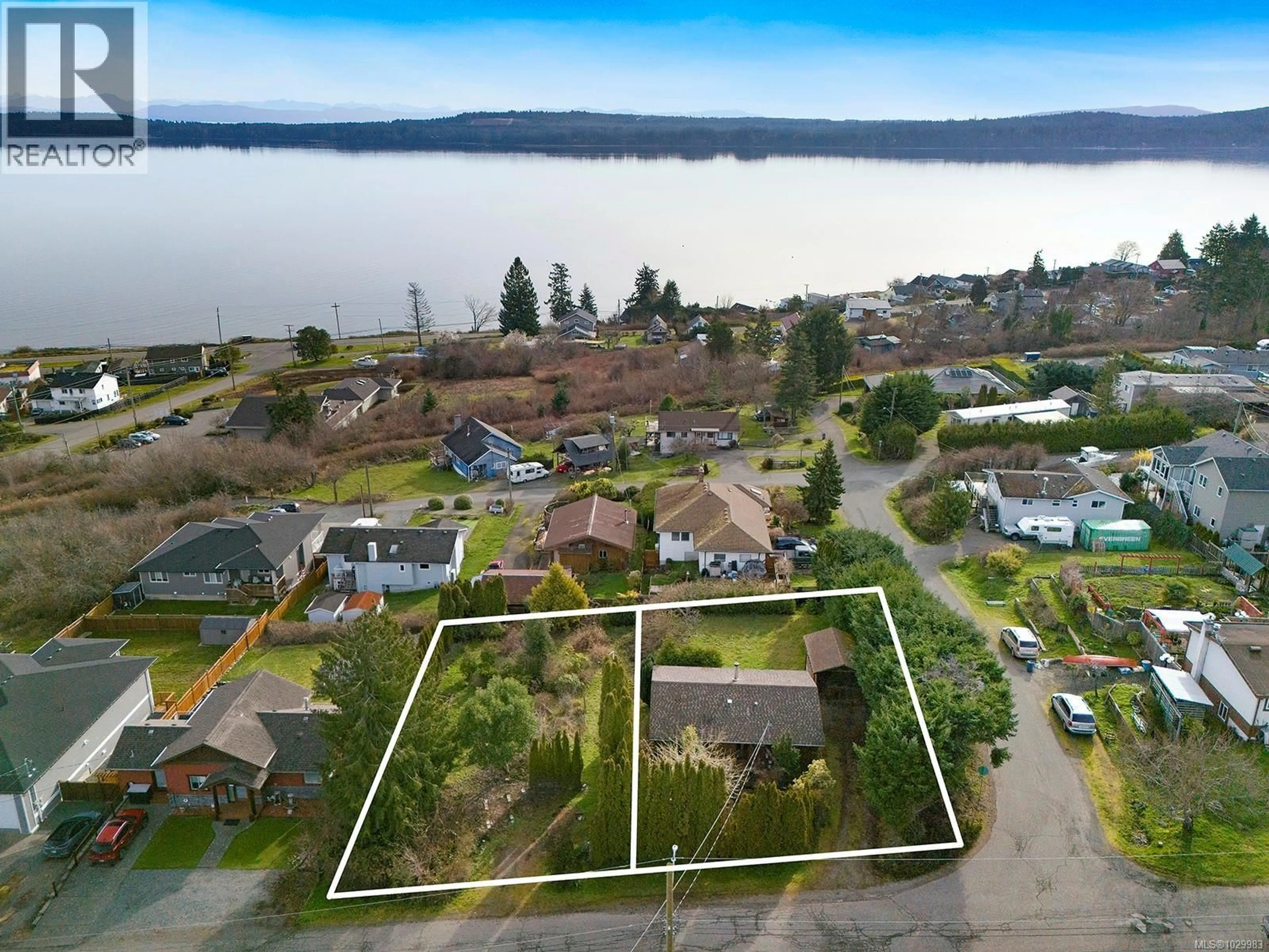 A pic from outside/outdoor area/front of a property/back of a property/a pic from drone, water/lake/river/ocean view for 5608 4TH STREET, Union Bay British Columbia V0R3B0