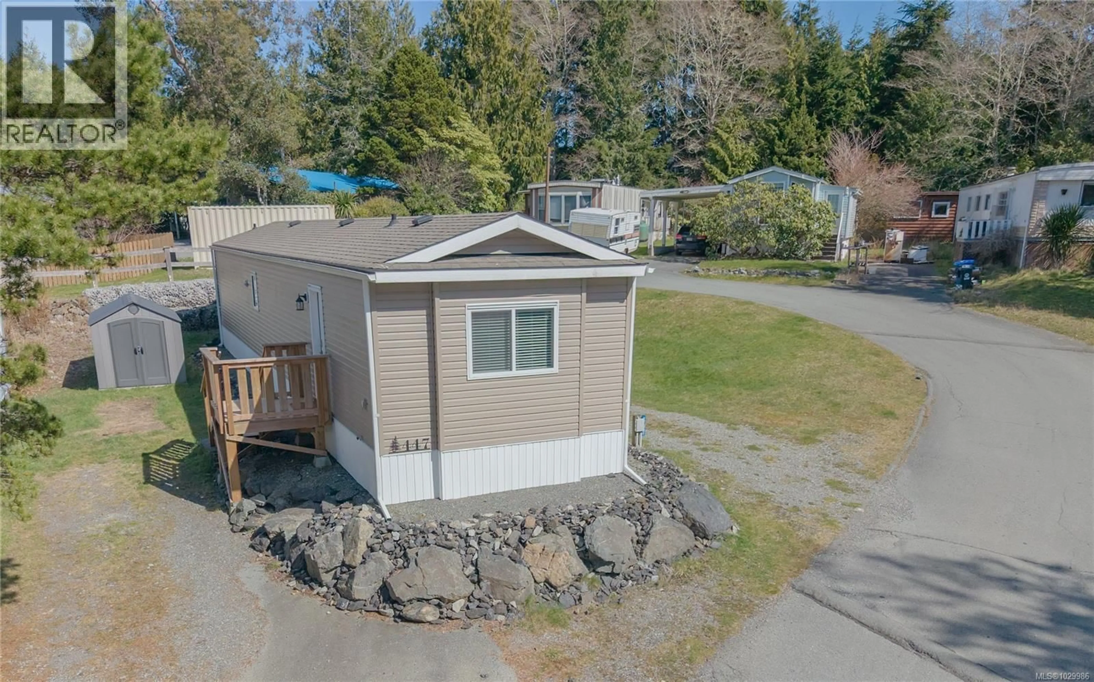 A pic from outside/outdoor area/front of a property/back of a property/a pic from drone, unknown for 447 ORCA CRESCENT, Ucluelet British Columbia V0R3A0