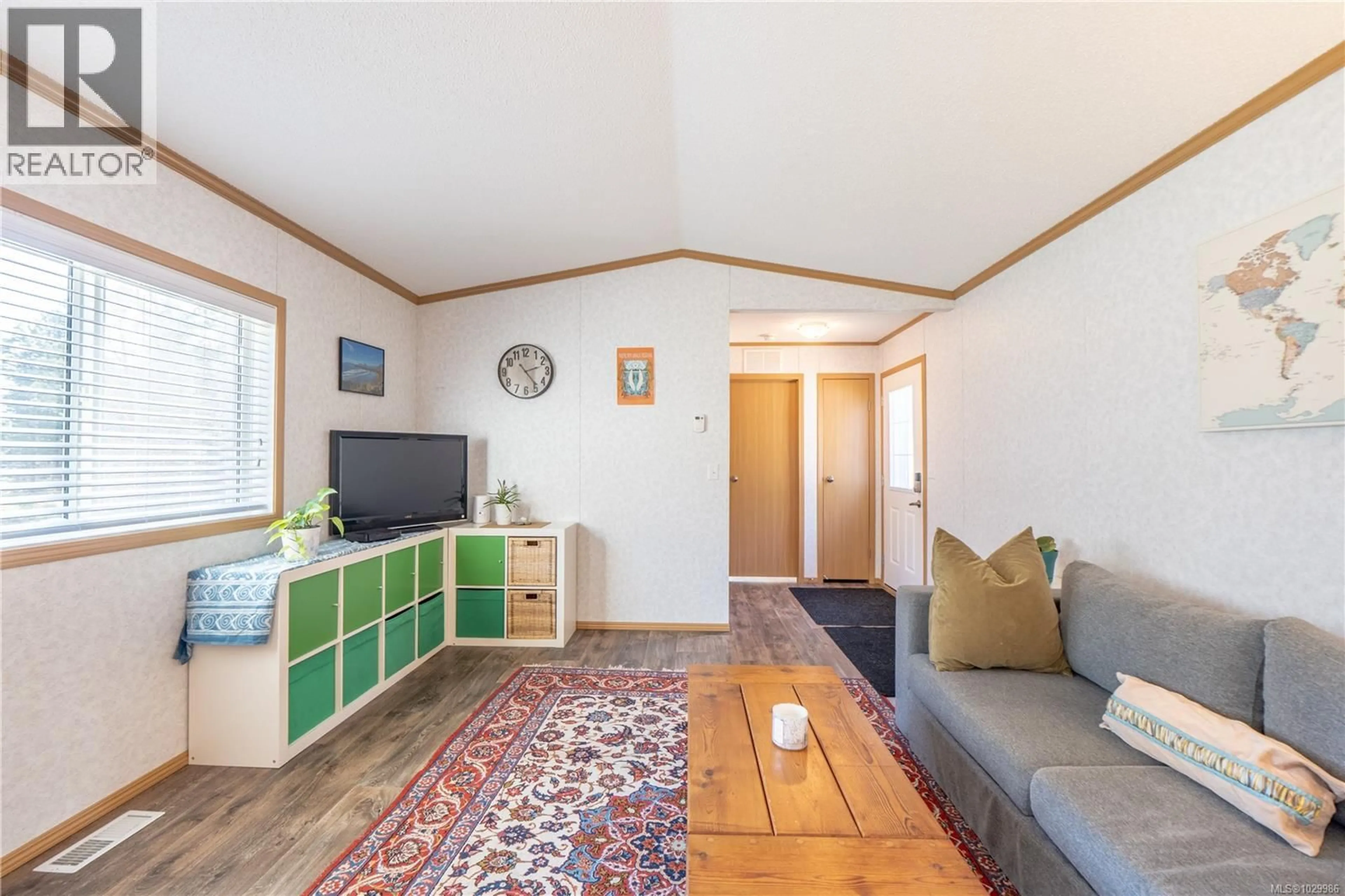 Living room with furniture, unknown for 447 ORCA CRESCENT, Ucluelet British Columbia V0R3A0