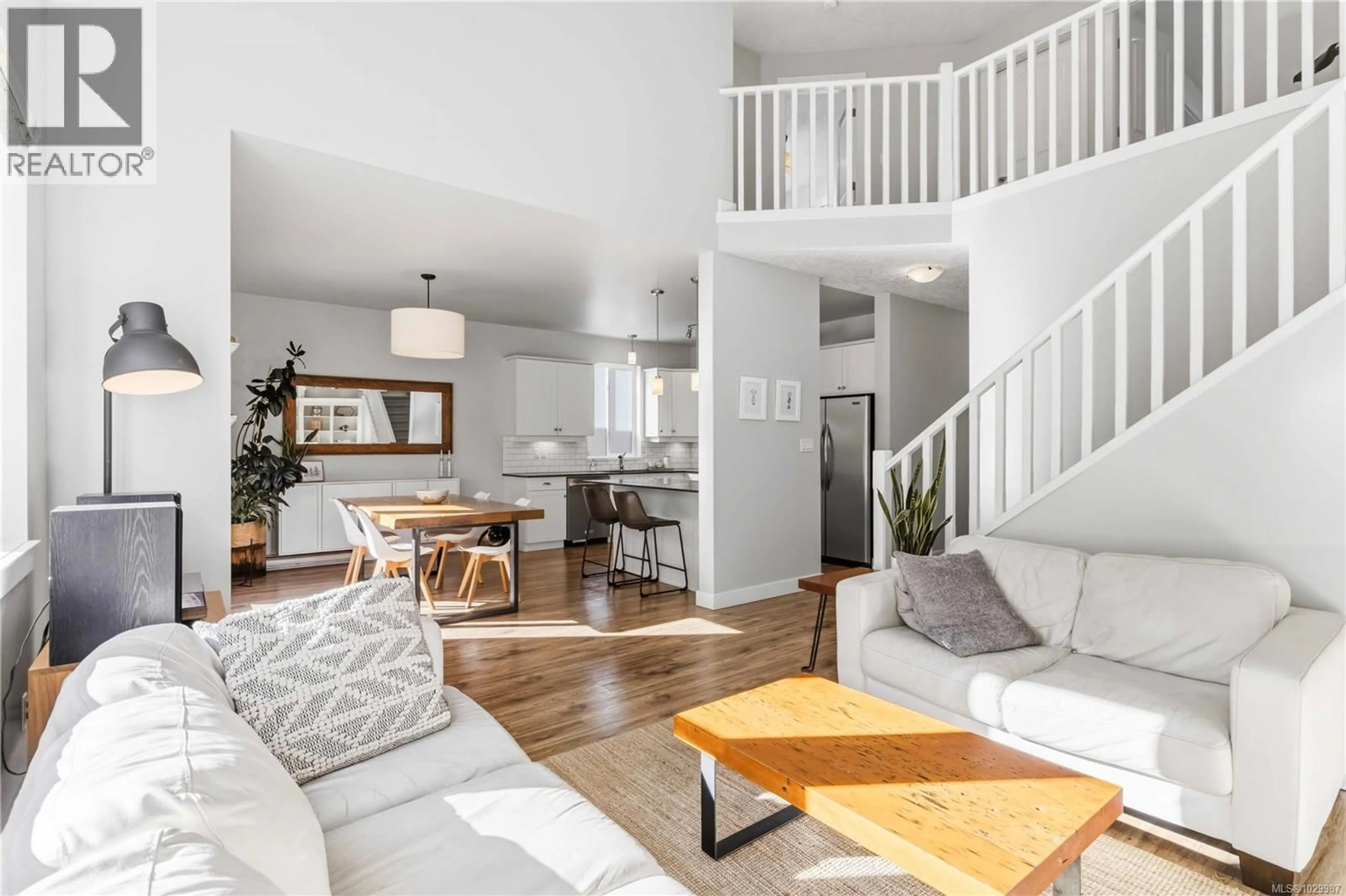 Living room with furniture, wood/laminate floor for 3692 WILD BERRY BEND, Langford British Columbia V9C4M7